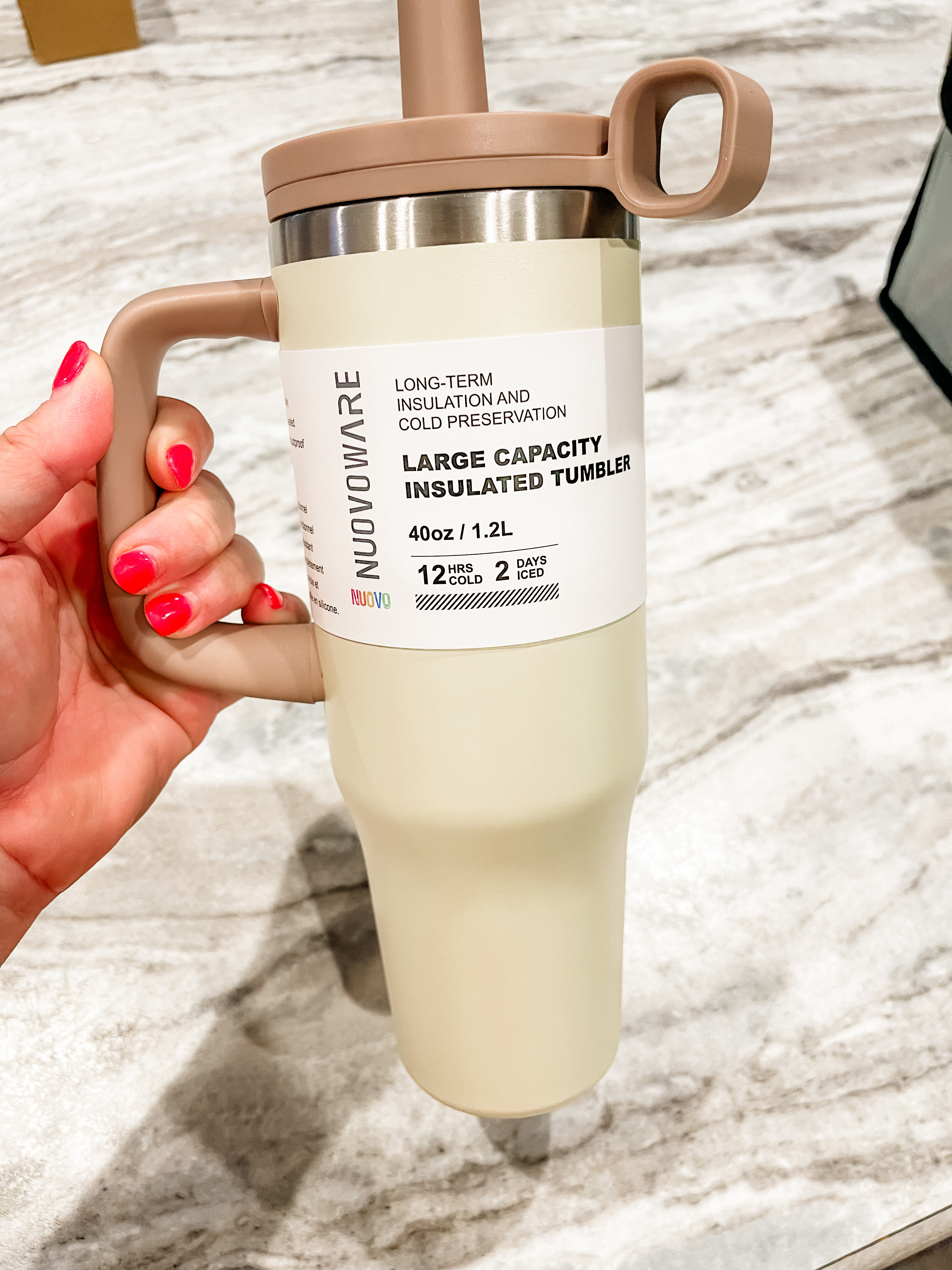 40 oz insulated tumbler with handle = my everyday essential! 🤍 Perfect for iced coffee, water, road trips, work from home, mom life, errands, and staying hydrated all day. If you're looking for a large travel mug, stainless steel tumbler, cup holder-friendly water bottle, or neutral aesthetic drinkware, this one is a favorite.

#40ozTumbler #InsulatedTumbler #TravelMug #WaterBottle #HydrationGoals #MomMustHaves #WorkFromHome #AmazonFinds #KitchenFavorites #EverydayEssentials #NeutralHome #CoffeeLover #IcedCoffee #Drinkware #LTKFinds #HomeEssentials #DailyFavorites #OnTheGo #LifestyleFinds #CupHolderFriendly 

 #LTKdayinmylife #LTKfitnessgoals #LTKfoodie