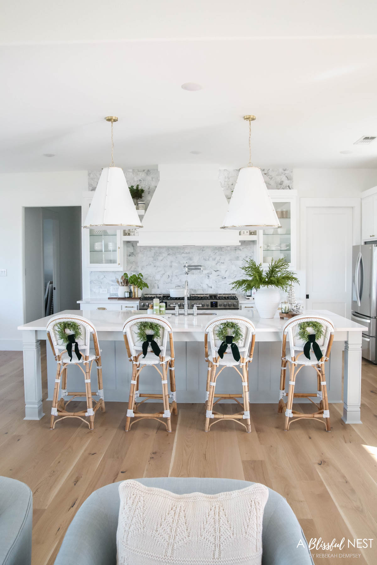 I kept the kitchen clean and cozy last Christmas. Shop the same look now.
wooden spoons, bamboo dish scrub brushes, Mrs. Meyer's kitchen set, European mill, illuminated mercury Christmas trees, artificial Norfolk pine branches, suede velvet ribbon, faux juniper wreath, textured ribbed vase, Thymes Frasier Fir candle, Mud Pie utensil holder, faux blueberry stems, scented candle 

 #LTKHoliday #LTKSeasonal #LTKHome