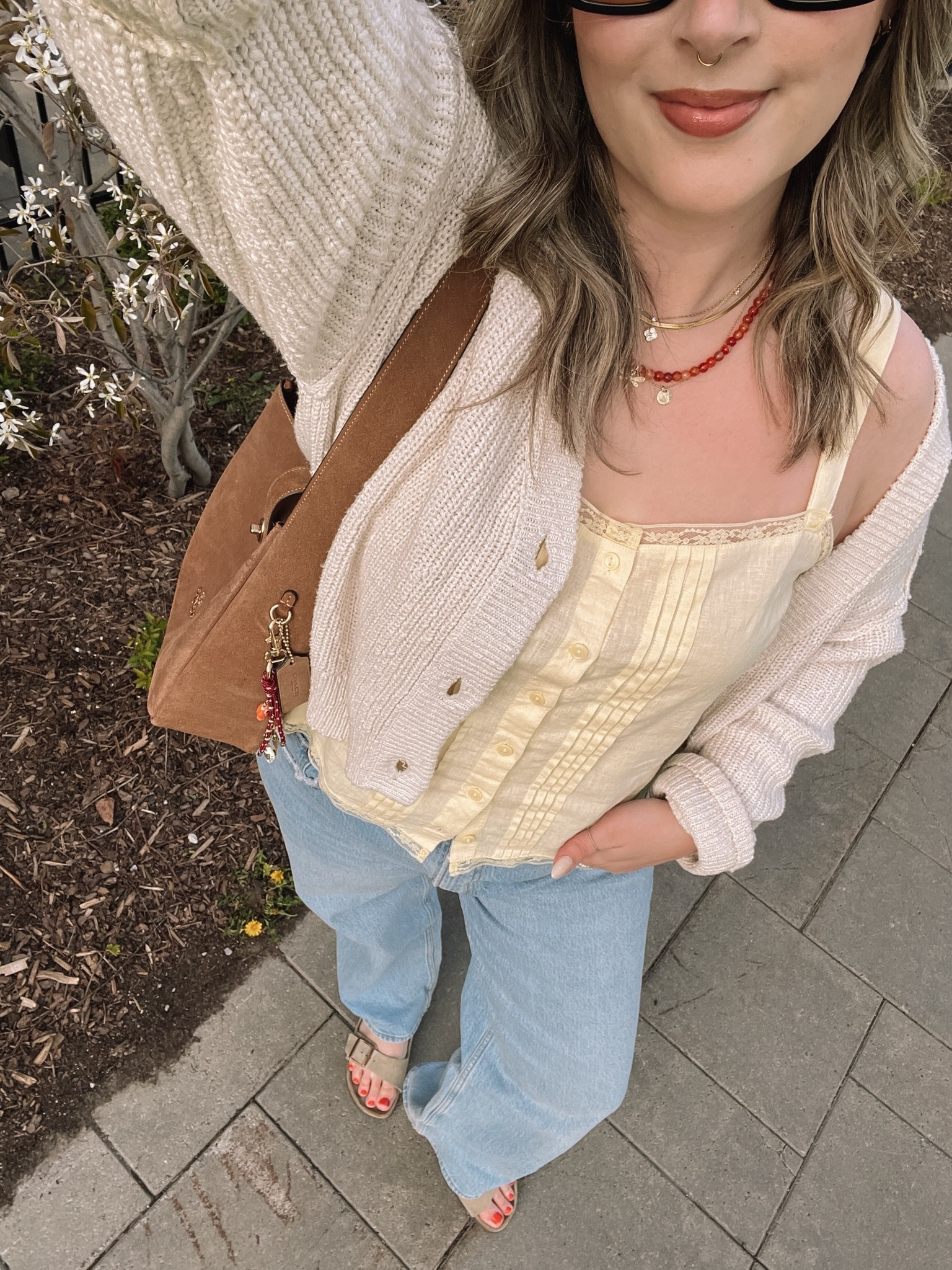 Casual spring outfit! Wearing my usual L in the butter yellow tank top (Canadian link under “similar products”). Wearing 32 in my Abercrombie jeans for a looser fit. Cardigan is old but I linked an almost identical one! Birkenstock sandals fit TTS

#LTKjeans #LTKmidsize #LTKstyletip