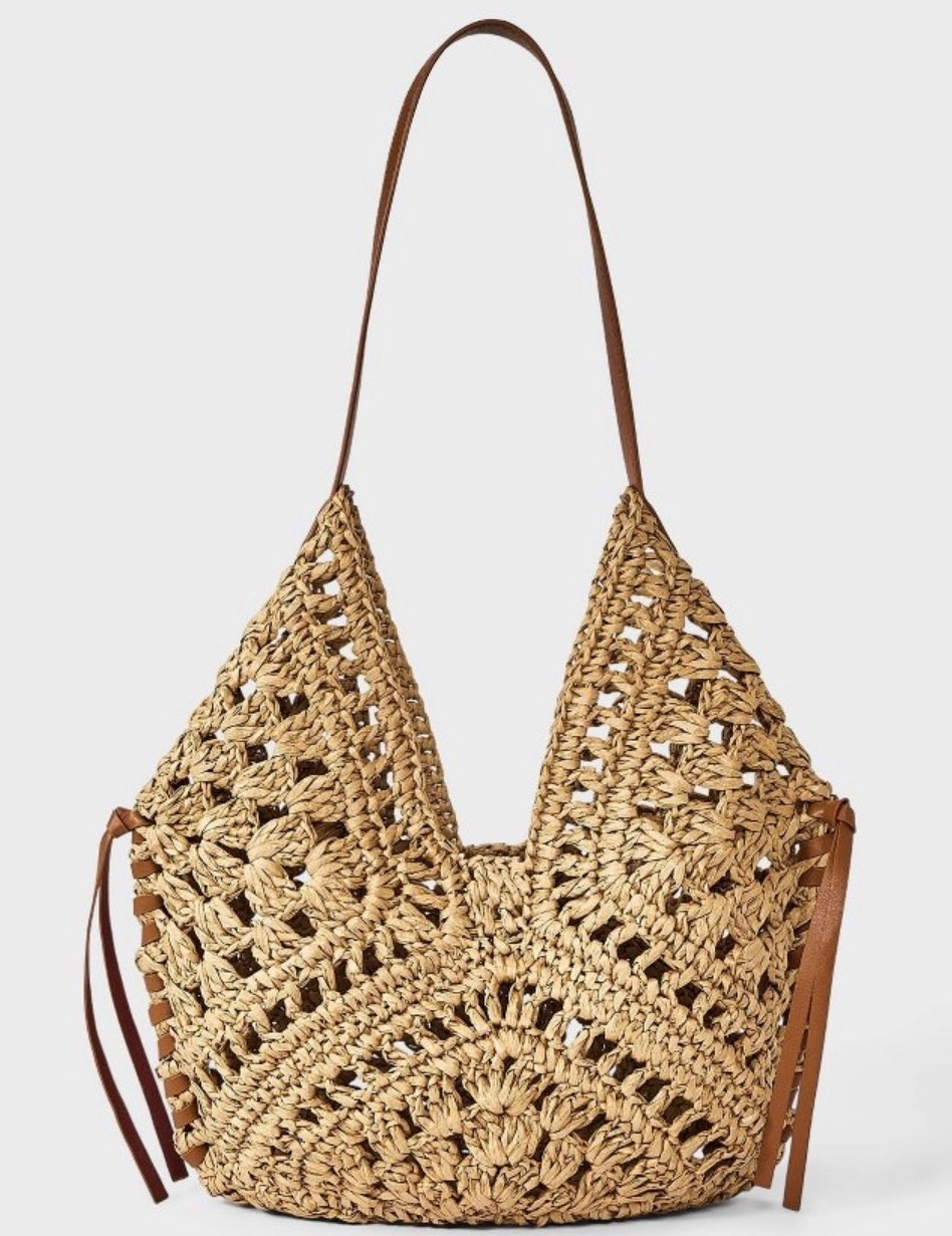 Must have for summer! 
Love this bag and it comes in 2 colors 
@Target 