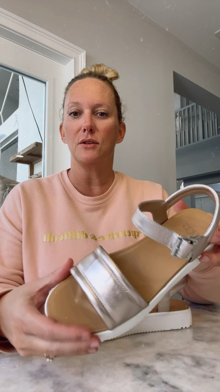 The MOST comfy walking sandals! These Ugg Sandals are so cute & comfy! They come in several colors and the White & Rose Gold (shown) are on sale! Run, don’t walk!!! BUY THEM!!! Also, size down a half size. I’m a true size 9 and I had to return them for an 8 1/2.

#LTKunder50 #LTKtravel #LTKshoecrush