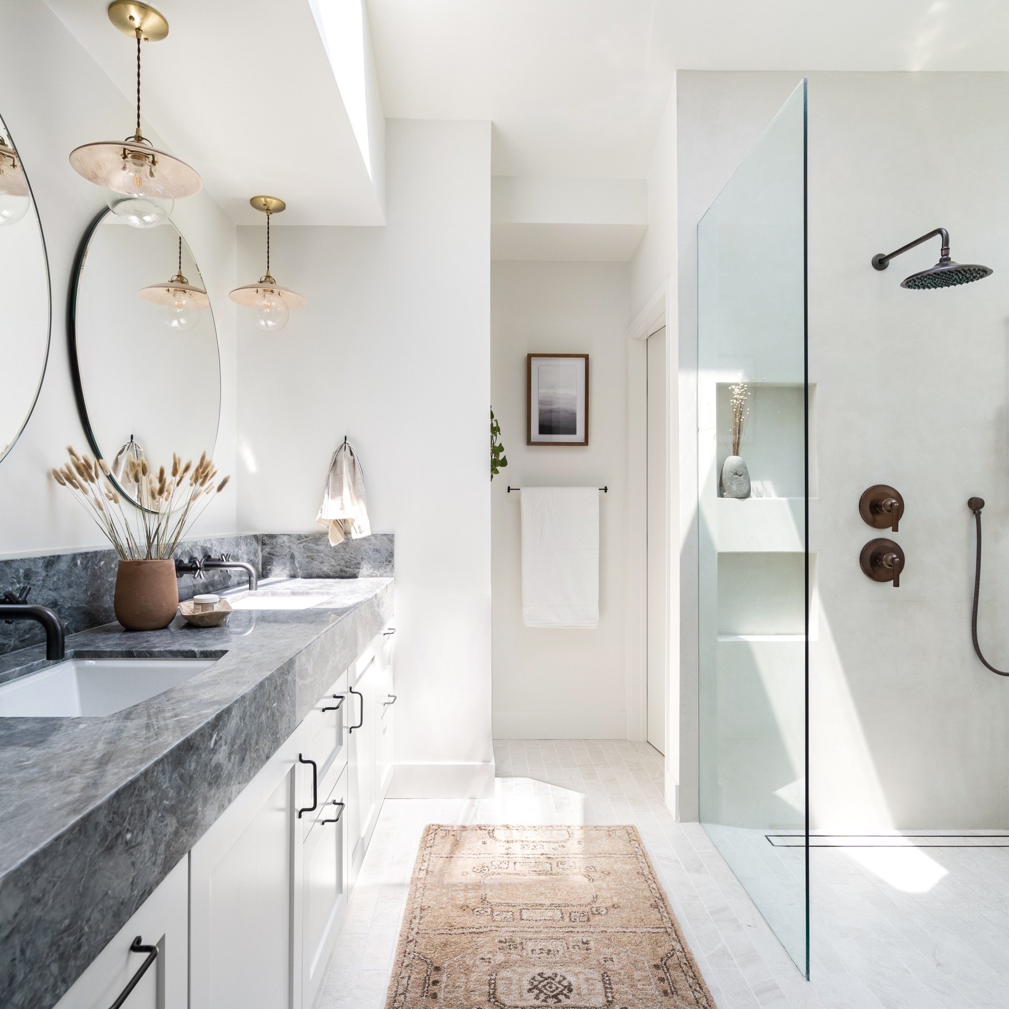 Luxurious primary bathroom inspired by California casual style with earthy tones and textures, rug, pendant, runner, side table, mirror, ladder, towel bar. 

bathroom remodel, primary bathroom, interior design, home decor, shower, faucet. 

#LTKunder50 #LTKhome #LTKunder100