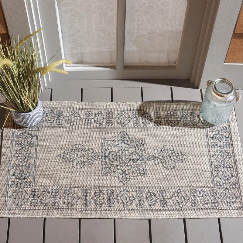 Arneshia Southwestern Aqua Indoor/Outdoor Area Rug | Wayfair North America