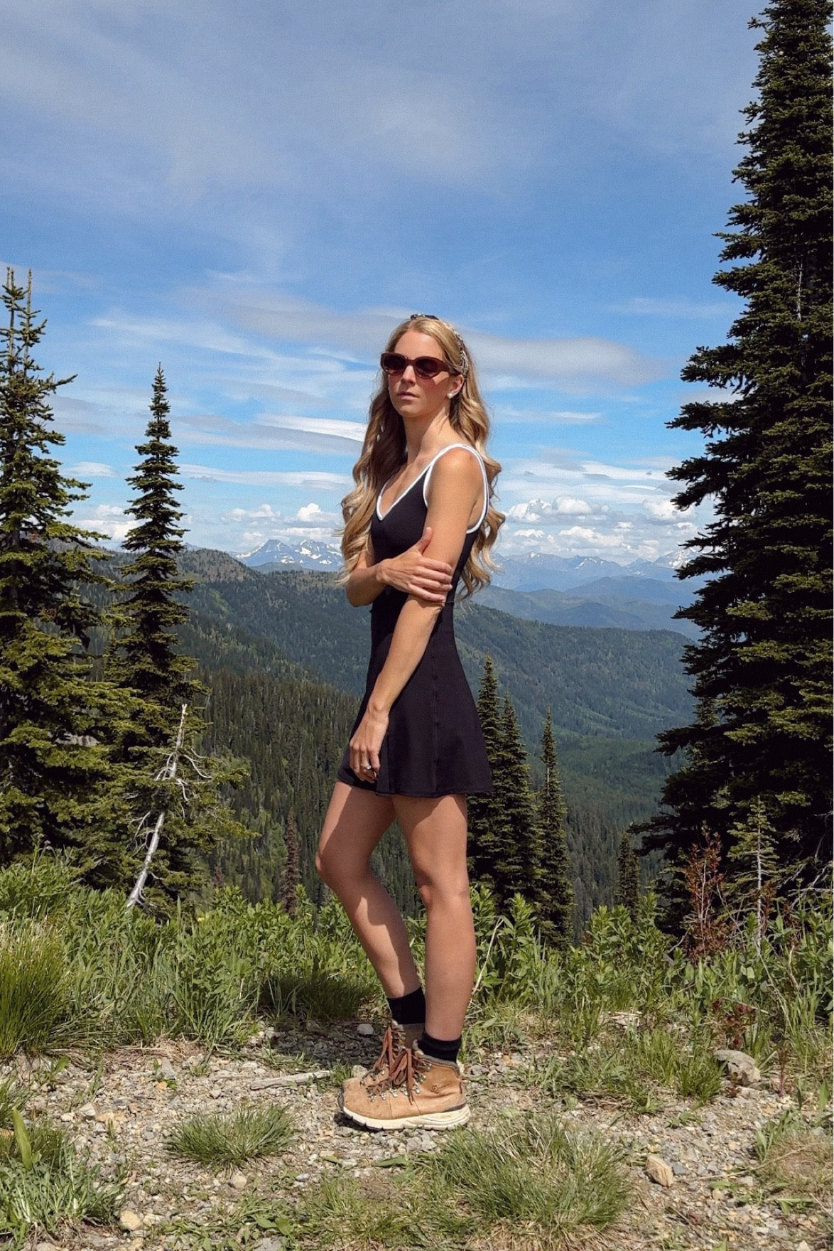 Meredith Blake vibes = Cute Hiking outfit: active dress dress, Danner boots, cute sunnies & FITS hiking socks

This black active dress with white piping has removable pads and built in shorts with pockets. It’s the perfect hike to lunch outfit. Adding a linen shirt or sweater was perfect for the cool mornings.

Danner hiking boots are my go to and have been for years. The mountain 600 is comfortable straight out of the box with no break in required.

They also travel well considering the size and weight of most hiking boots.

Classy hiking outfit, elevated hiking outfit, hiking style, national park, summer, alps, Europe hiking, mountain outfits, national park outfit, Abercrombie, traveler dress, Danner boots, fits hiking socks, active dress, Columbia hiking boots, Danner boots dupe, packing list, hiking outfit ideas, hiking boots, summer hike, active dress, activewear dress, summer outfit, walking outfit, glacier national park, Montana 

#LTKStyleTip #LTKShoeCrush #LTKActive