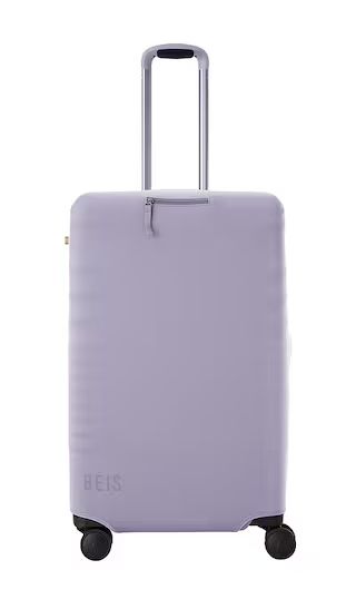 BEIS The Medium Check-in Luggage Cover in Purple. | Revolve Clothing (Global)