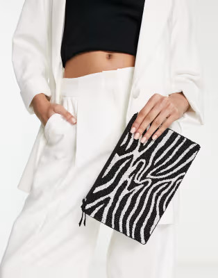 True Decadence zip top beaded clutch bag in zebra print | ASOS (Global)