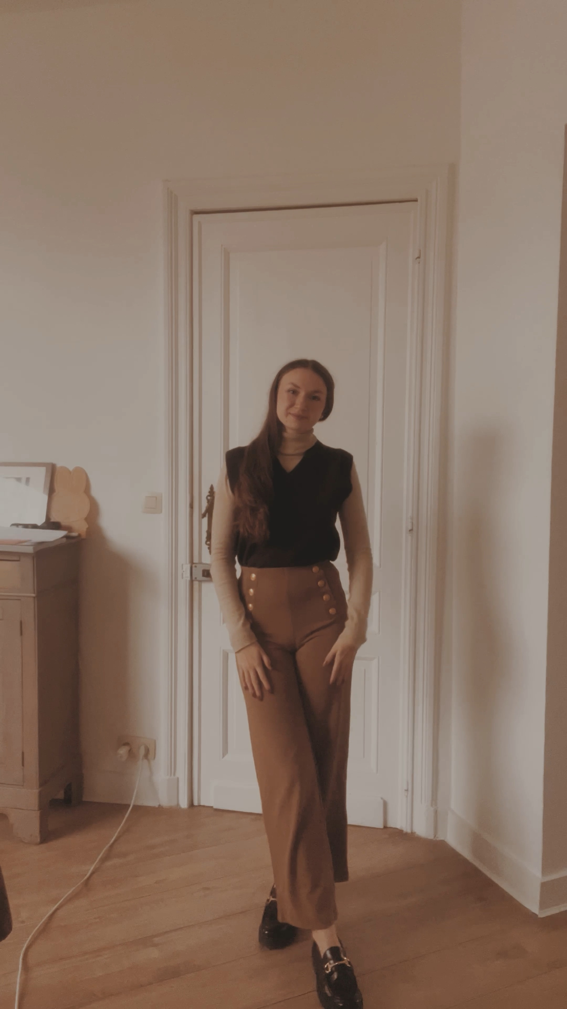 Beige turtleneck 
Brown sweater vest
Brown trousers with gold buttons detail
Brown loafers with buckle detail 

Light academia 
Light academia outfit 
Light academia style 
Light academia aesthetic 
Neutral outfit 
Autumn outfit 
Autumn fashion 
Autumn fashion inspo

#LTKU #LTKSeasonal #LTKFindsUnder50