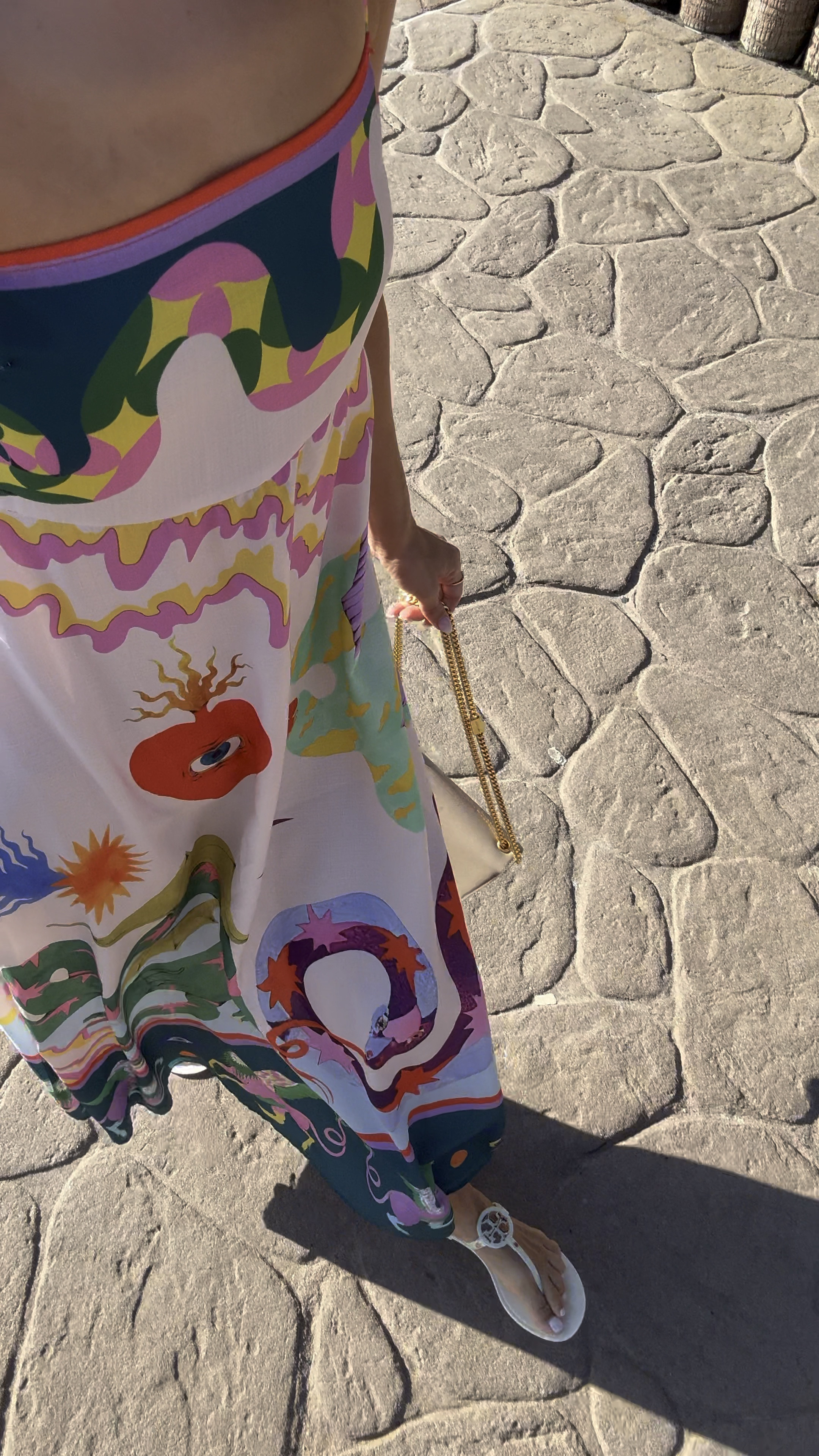 Amazon vacation maxi dress with pockets and adjustable straps! Color is ‘cami colorful’. Dress is *slightly* sheer but I wore this out with nude undergarments and it was fine! Vacation dress. Resort wear. YSL bag. Tory Burch jelly sandals are TTS. 

#LTKTravel #LTKShoeCrush #LTKItBag