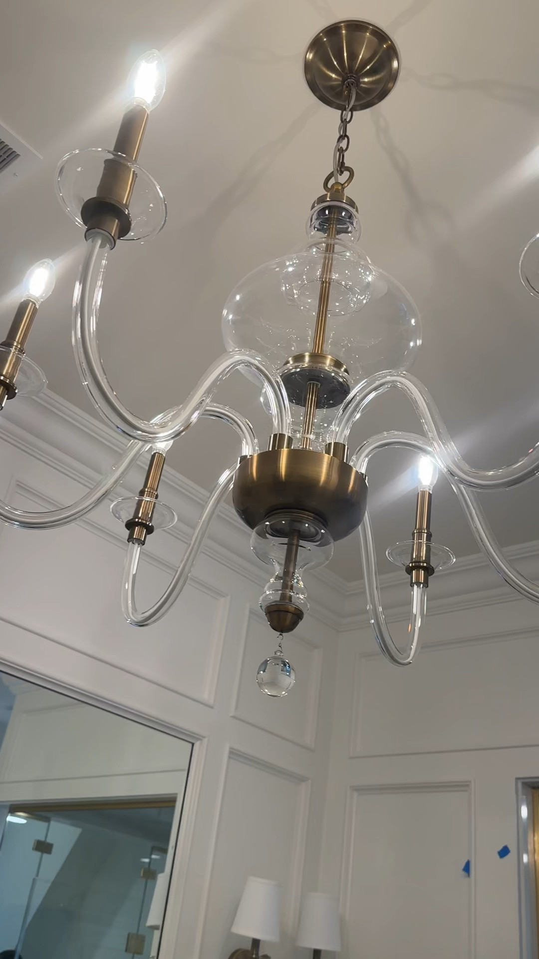 Ballard design blown glass and gold chandelier and matching double wall sconces 

#LTKstyletip #LTKsalealert #LTKhome