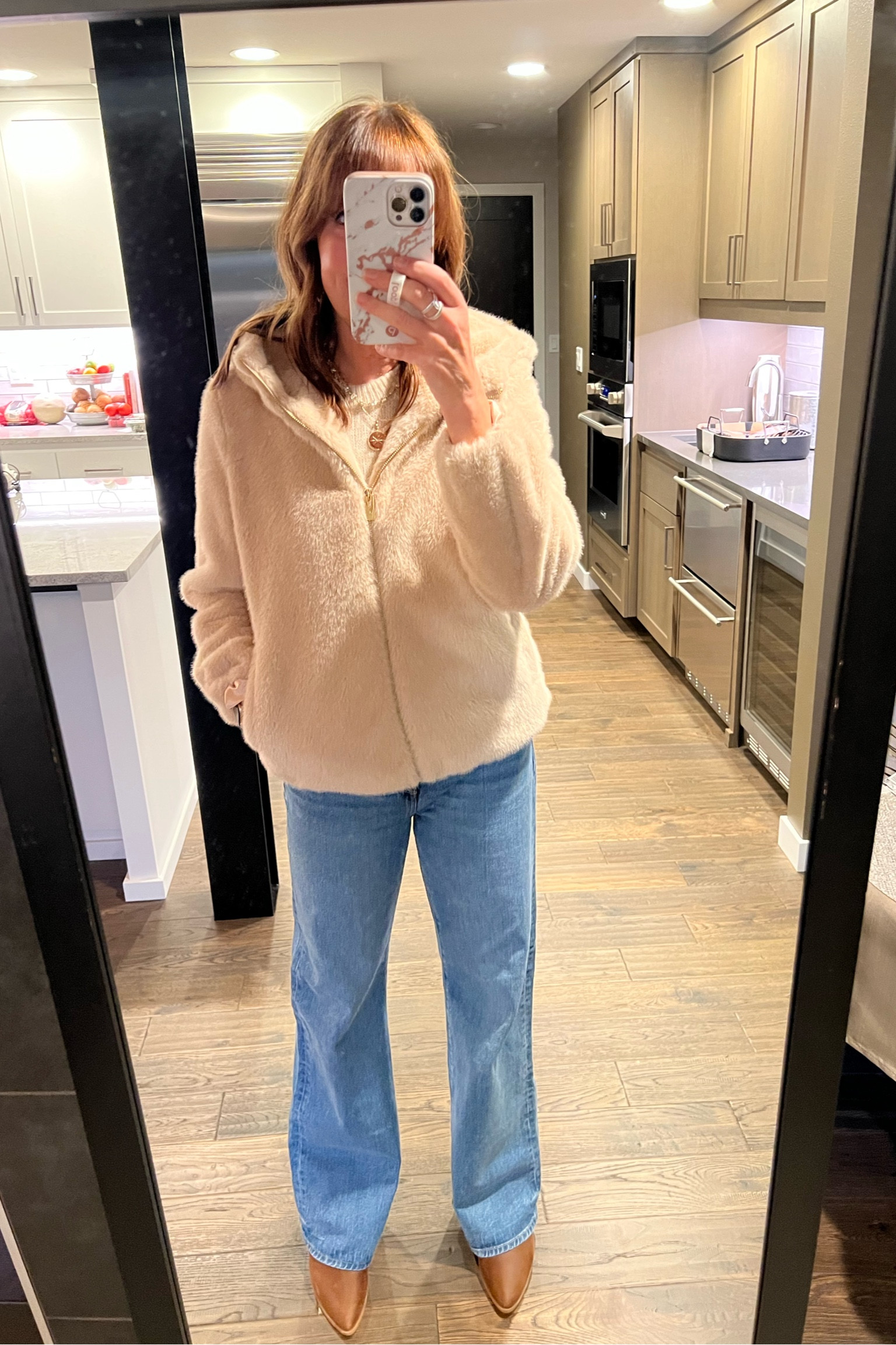 A casual outfit elevated with this cute faux fur hooded jacket! It comes in black, too! This would make the perfect gift! It’s also on sale! 
Via Spiga, faux fur jacket, gift idea, Journee boots, Loft jeans, wide leg jeans, date night outfit 

#LTKStyleTip #LTKOver40 #LTKSaleAlert