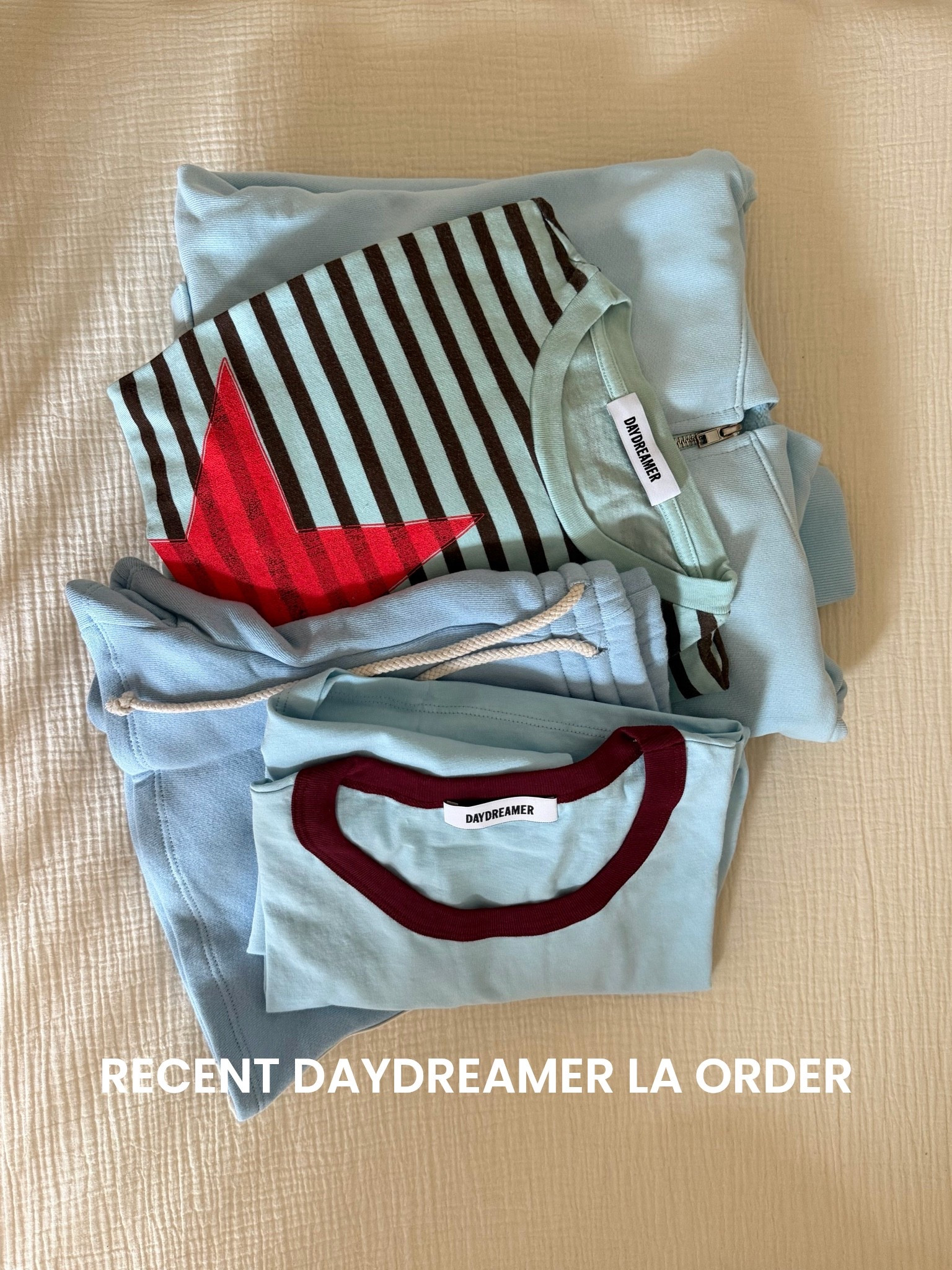 Recent order from daydreamer I guess I had blue on my mind haha Size L in tees and the other is one size it fits like an XL!