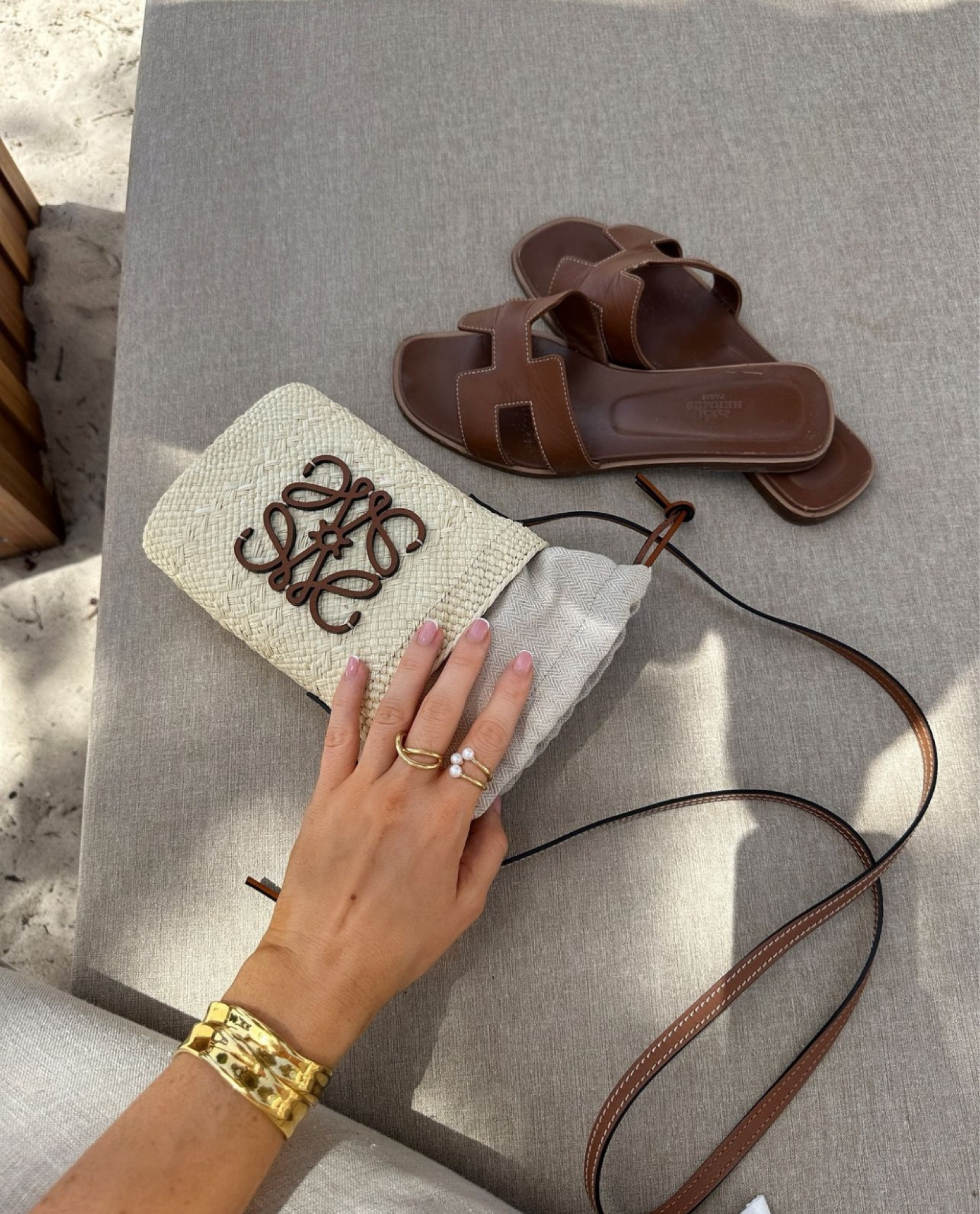 Gold and tan accessories are a summer must

#LTKbag #LTKsummer #LTKluxury
