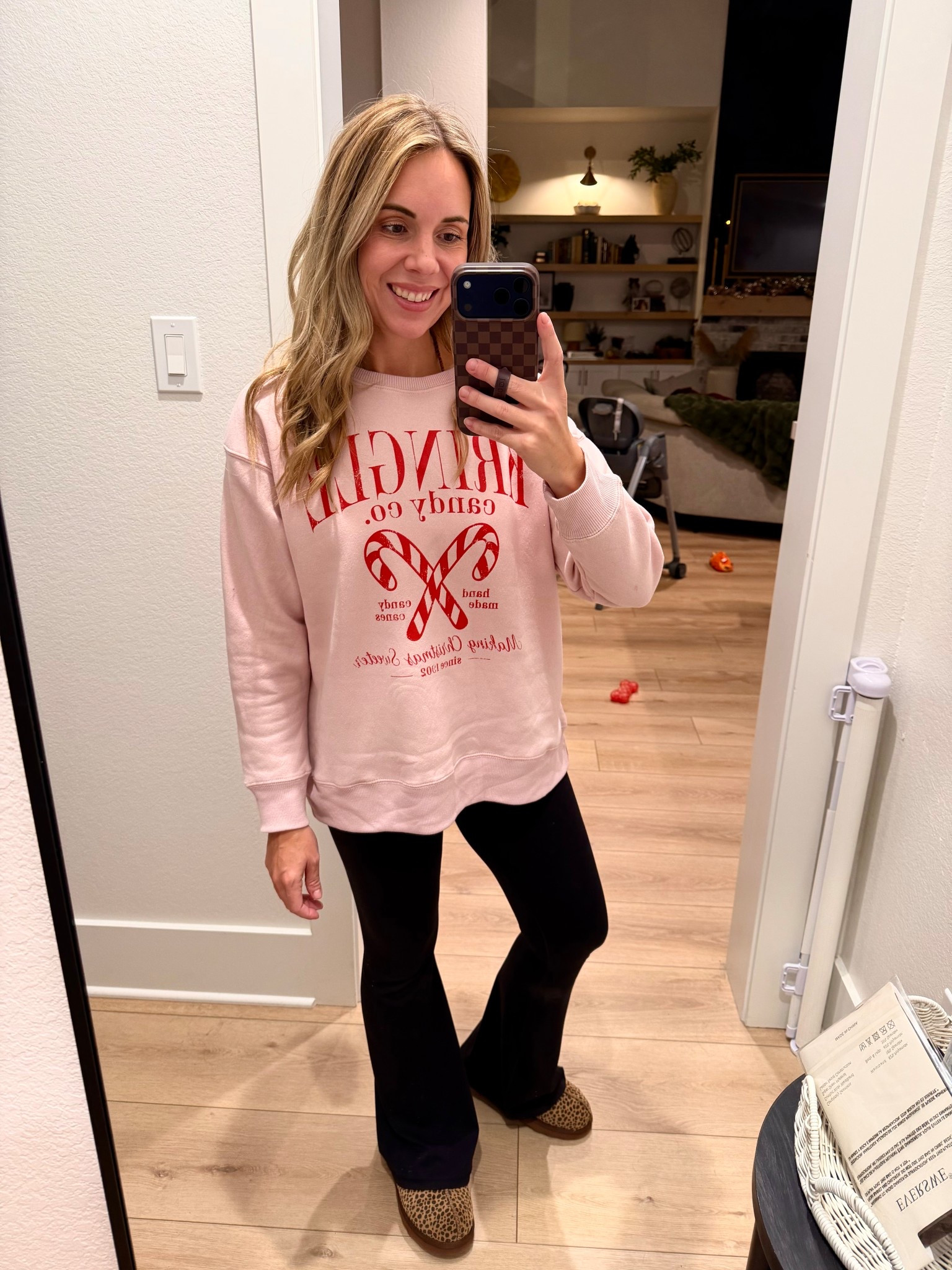 This is my true size small in this Walmart Christmas sweatshirt and it fits a little roomy! Walmart Christmas outfit. Candy cane sweatshirt. 

#LTKmomlife #LTKHoliday