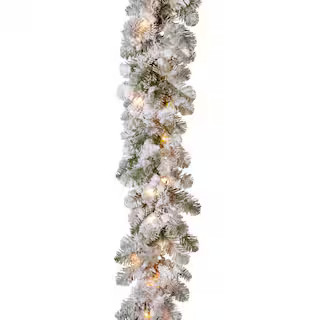 National Tree Company 9 ft. x 12 in. Feel Real Snowy Camden Garland with 50 Clear Lights PECD3-30... | The Home Depot