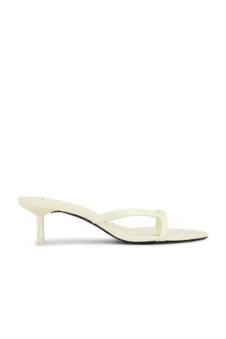 BLACK SUEDE STUDIO Emilia 50 Kitten Heel in Butter Patent Yellow from Revolve.com | Revolve Clothing (Global)