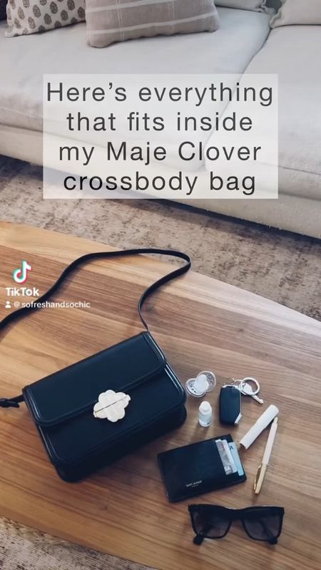 40% off right now!!
Reposted from my TikTok account: Here’s everything that fits inside my Maje Clover black leather crossbody bag! It’s large but not too large, affordable (under $300 right now!), and SO chic! 
-
Affordable luxury - black leather purse - everyday black purse - crossbody leather bag - gift for her - Celine triomphe alternative - affordable bag - affordable leather purse - work outfit - green leather bag - red leather crossbody bag - pink leather bag - luxury holiday gift for her - luxury Christmas gift for her - brown leather crossbody bag

#LTKsalealert #LTKGiftGuide #LTKitbag