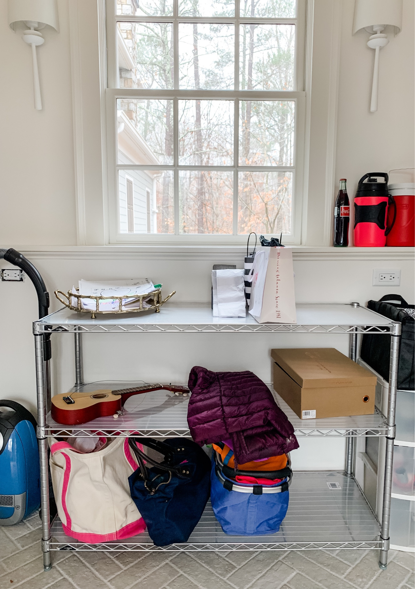 Every home needs a drop zone for all that comes in (purse, mail, packages) and goes out (returns, repairs, dry cleaning). 
This one set up in a laundry room off the back entrance keeps the clutter out of the kitchen  

#LTKhome