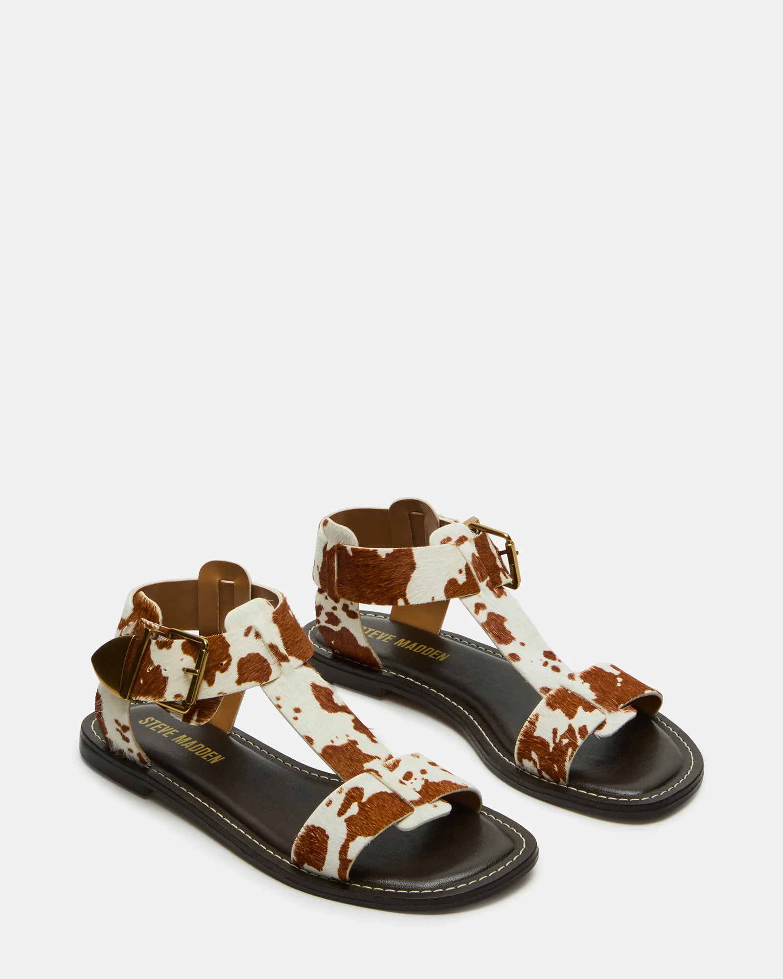 BRAZINN Brown Cow Print Strappy Flat Sandal Women's Sandal | Steve Madden (US)