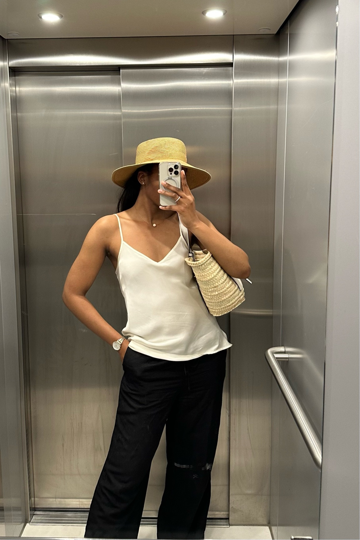 OOTD: A heatwave outfit for 33 degrees. A simple white silk cami, flowy black linen trousers, black comfy loafers, and a basket bag. This will do the trick for the hot weather! 🥵☀️

Silk cami @intimissimiofficial 
Linen trousers and hat @hm 
Loafers @paul_green 
Basket bag @loewe 

Exact or Similar pieces linked 

Follow  @edelbelar for more timeless chic outfits!

#LTKFindsUnder100 #LTKSeasonal #LTKStyleTip
