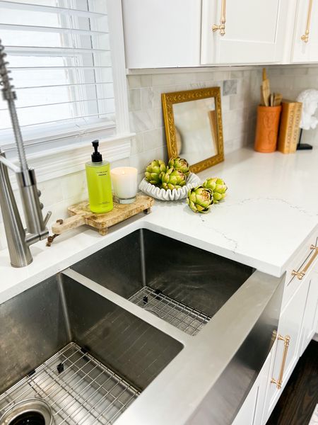 Kitchen sink styling with artichokes and favorite Claire Burke soap 

#LTKhome #LTKunder100 #LTKsalealert