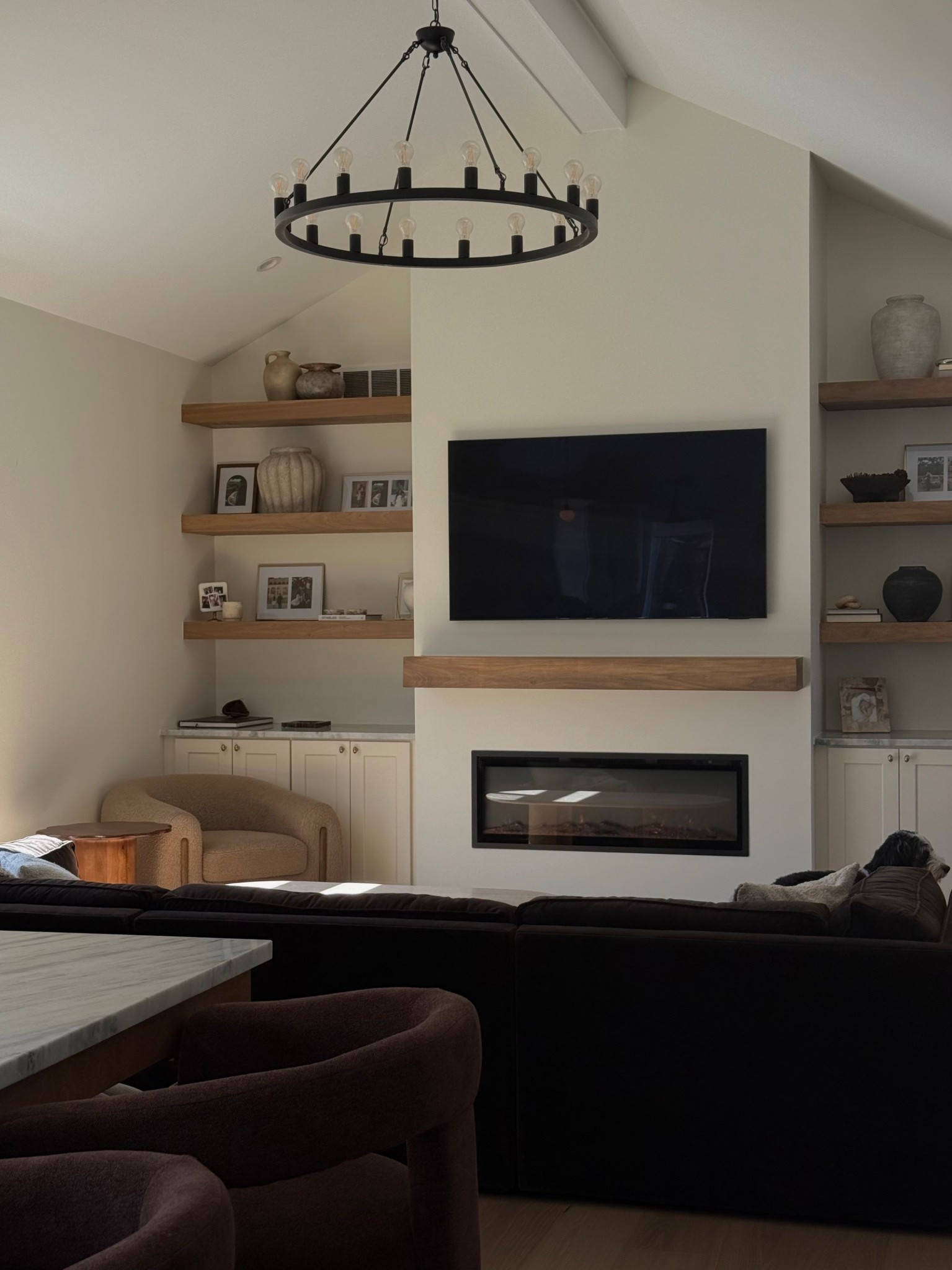 Our living room is starting to really come together 🥹🥹

Neutral living room, dark brown couch, brown couch, living room inspiration, living room ideas, living room aesthetic, toddler friendly furniture, floating shelves, shelf styling