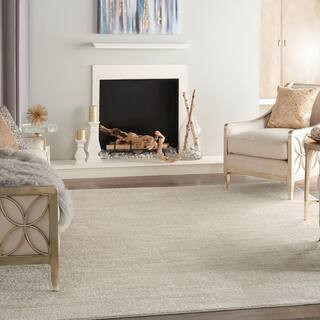 Essentials 8 ft. x 10 ft. Ivory Beige Solid Contemporary Indoor/Outdoor Patio Area Rug | The Home Depot