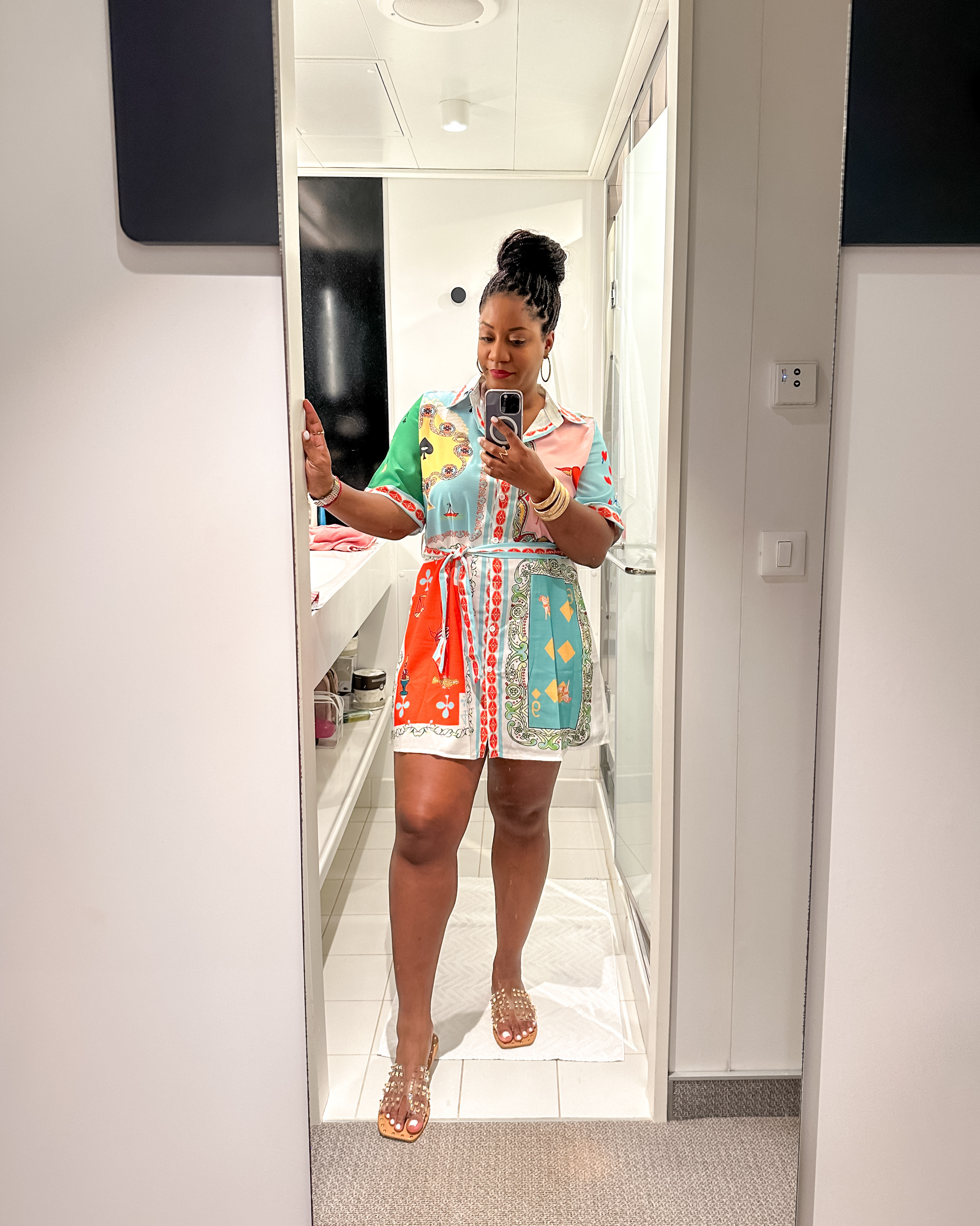 Vibrant vibes in this gorgeous sundress that I found on Amazon! I love the playful colors on this print! I wore the belt as a headband earlier in the day, then as a belt in the evening. I had to use fashion tape for the space in between the top two buttons, but I got so many compliments!  Wearing a size XL. 

 beach vacation | beach vacay | bikini | beach look | vacay look | vacation | casual dress | colorful dress | dress with sleeves | Amazon dress | Amazon finds

#LTKFindsUnder50 #LTKStyleTip #LTKMidsize