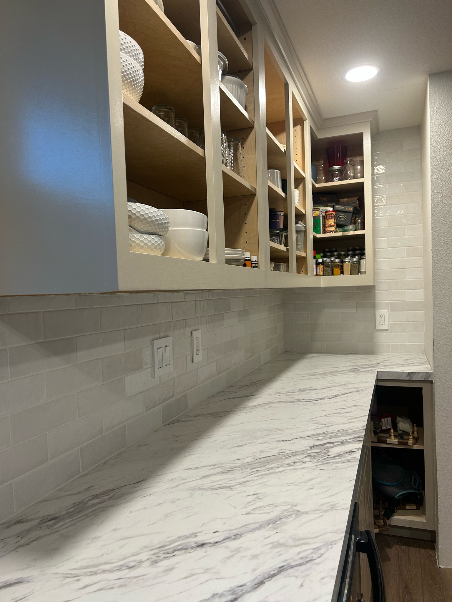 All the products we used for our white subway tile backsplash! 

I didn’t link the exact grout float or trowel we used because I didn’t like it—they were too big for wall tile. So this is what I would recommend instead for backsplash tile!