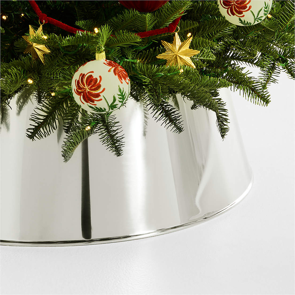 Polished Chrome Metal Christmas Tree Collar 27" | Crate & Barrel | Crate & Barrel