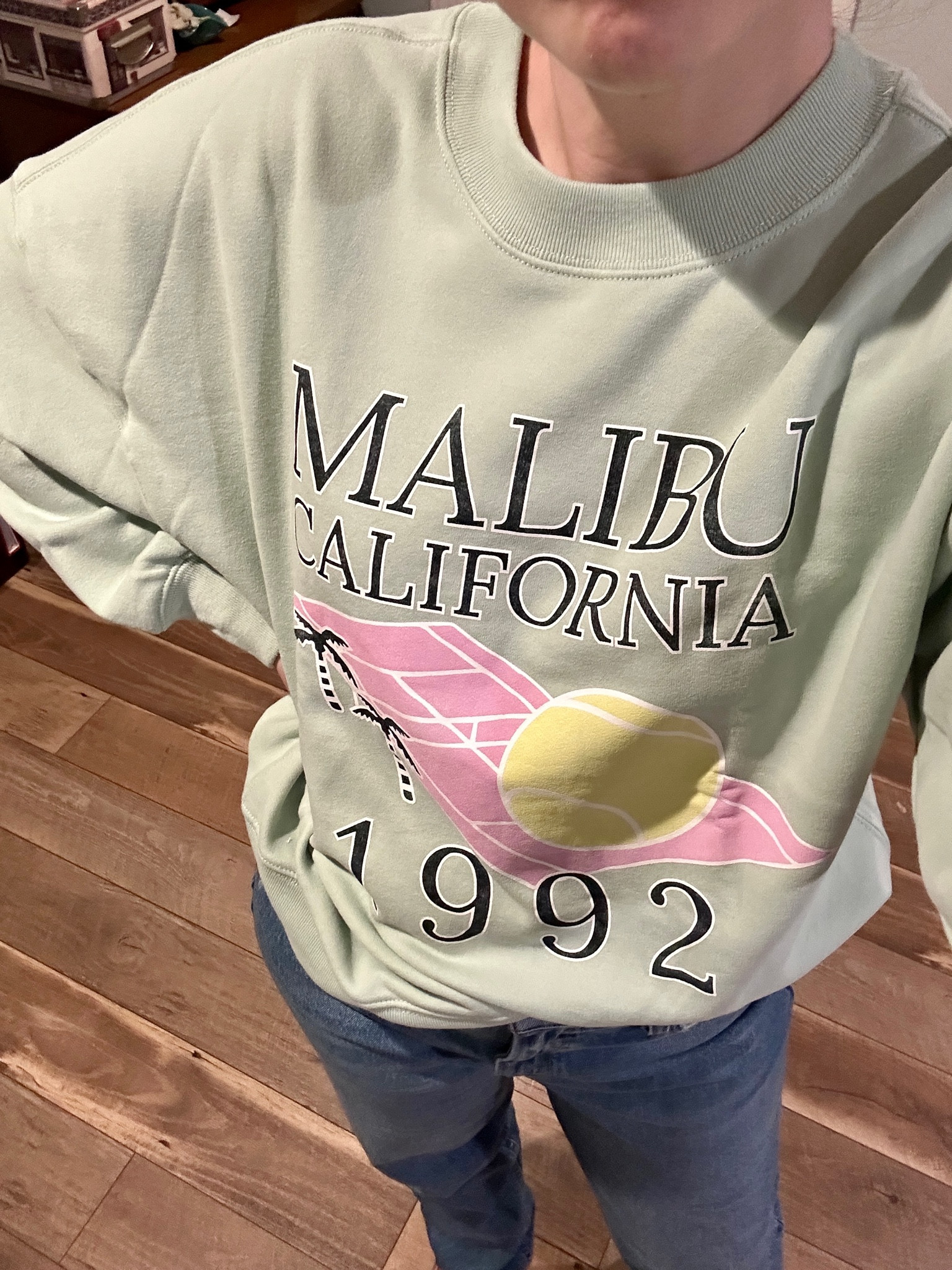 This shade of green makes me happy! And it has such a cute tennis graphic design on it. Paired this sweatshirt with Abercrombie curve love 90’s high rise straight jeans in 28L. 

#LTKFind #LTKstyletip #LTKSale