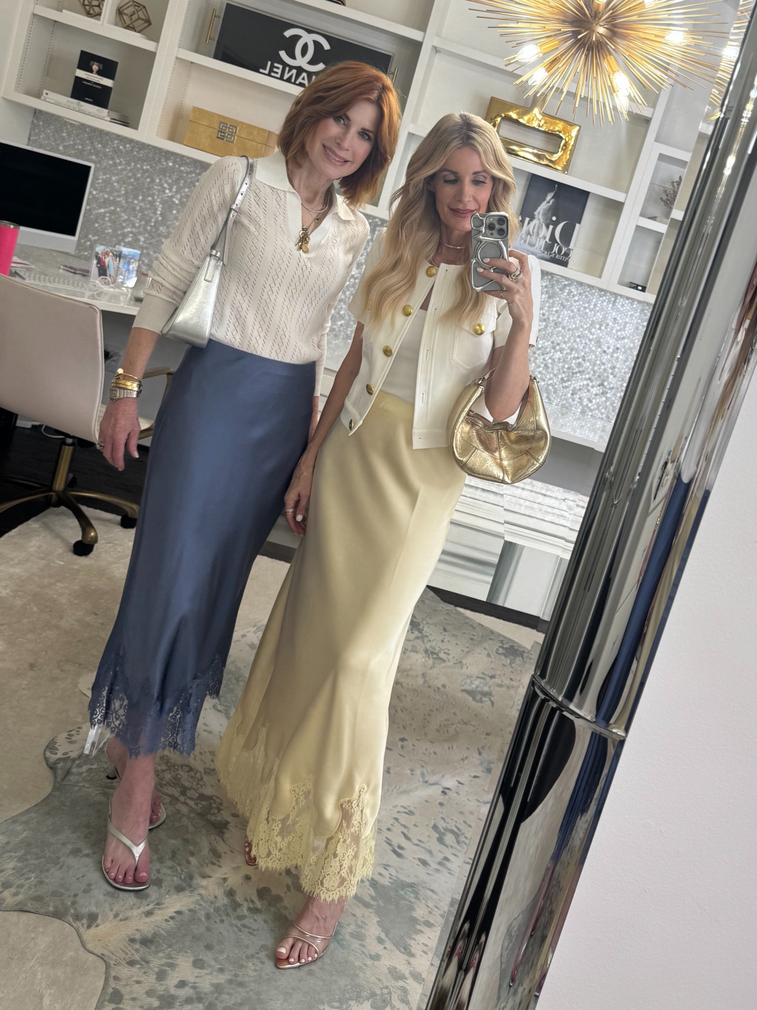 One of the hottest summer trends is a silk skirt with lace! Wearing mine with a white polo sweater and silver accessories. 

#LTKootd #LTKOver40 #LTKxMadewell