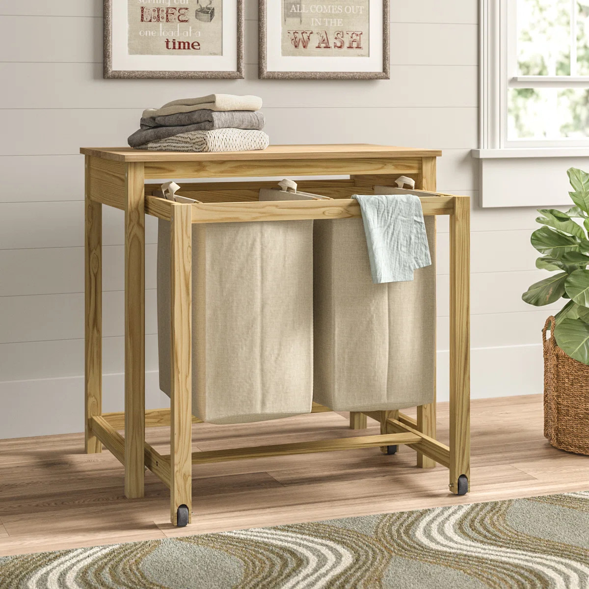Wood Rolling Laundry Sorter with HandlesByRebrilliant4.7Rated 4.7 out of 5 stars.203 Reviews | Wayfair North America