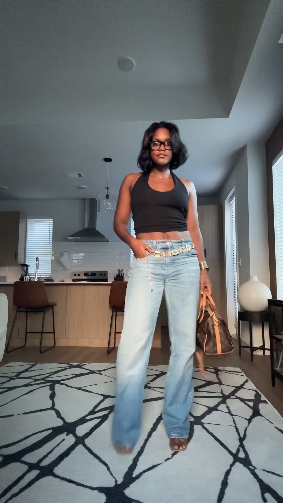 Girls night out look! Super easy and fun! Baggy jeans and baby tee is the cutest trend! Chain belt adds so much fun to the look! 

#LTKStyleTip #LTKShoeCrush #LTKFindsUnder50