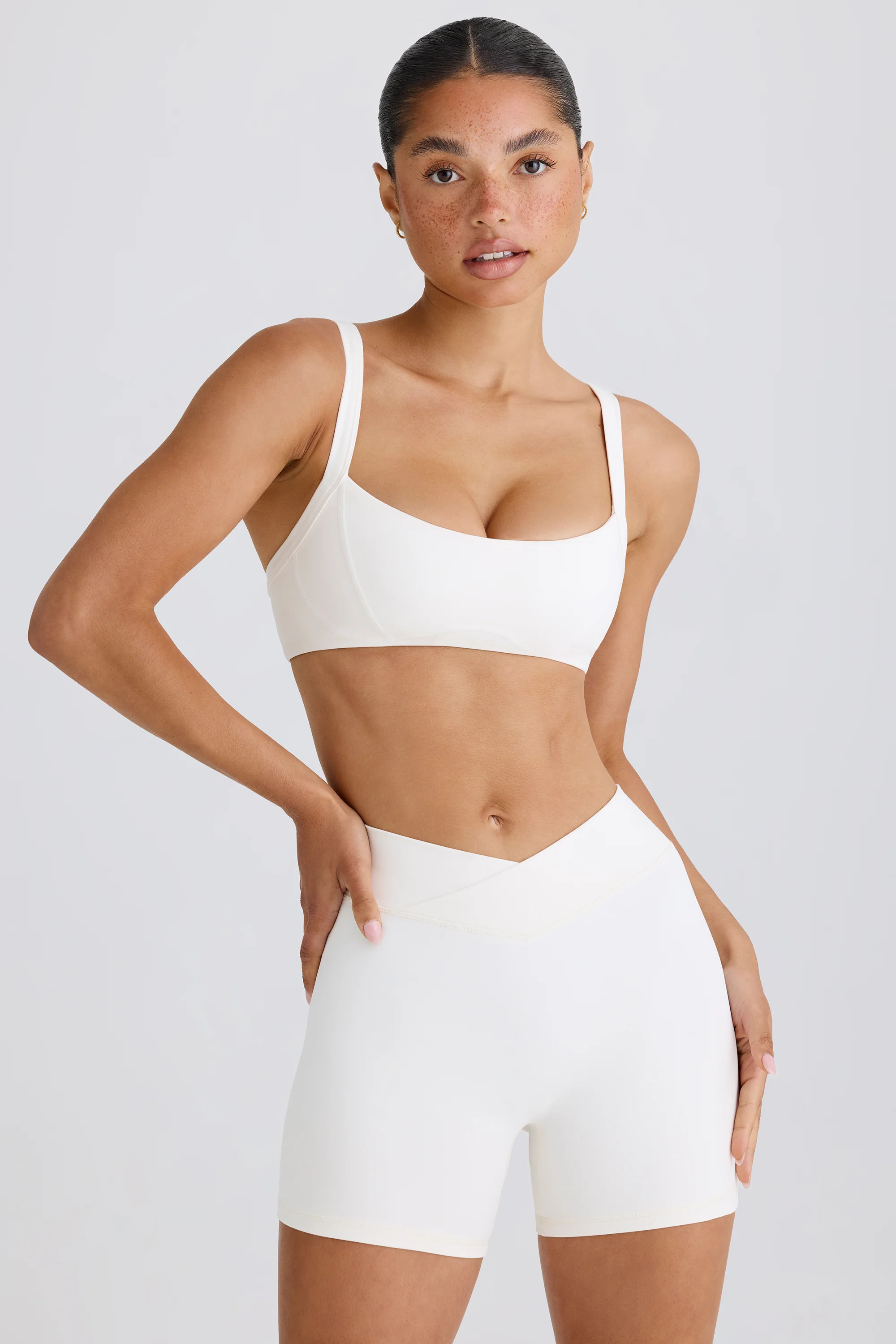 Soft Active Crossover Mini Shorts in White | Oh Polly