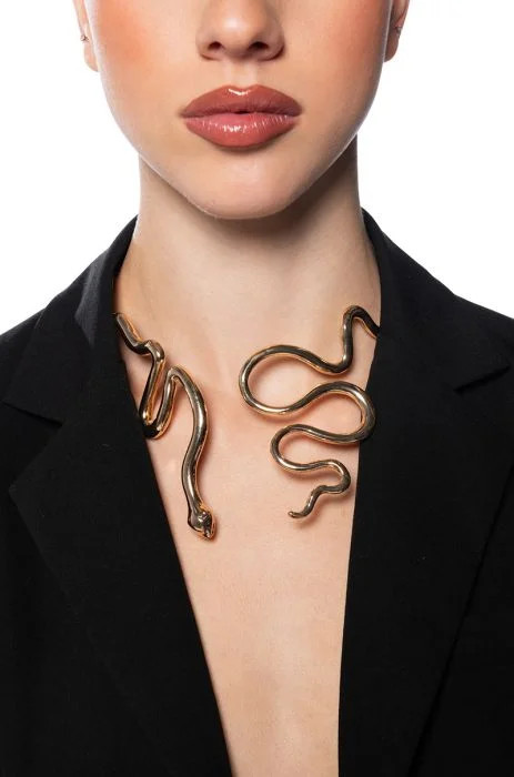 WINDING SNAKE STATEMENT NECKLACE in gold | AKIRA