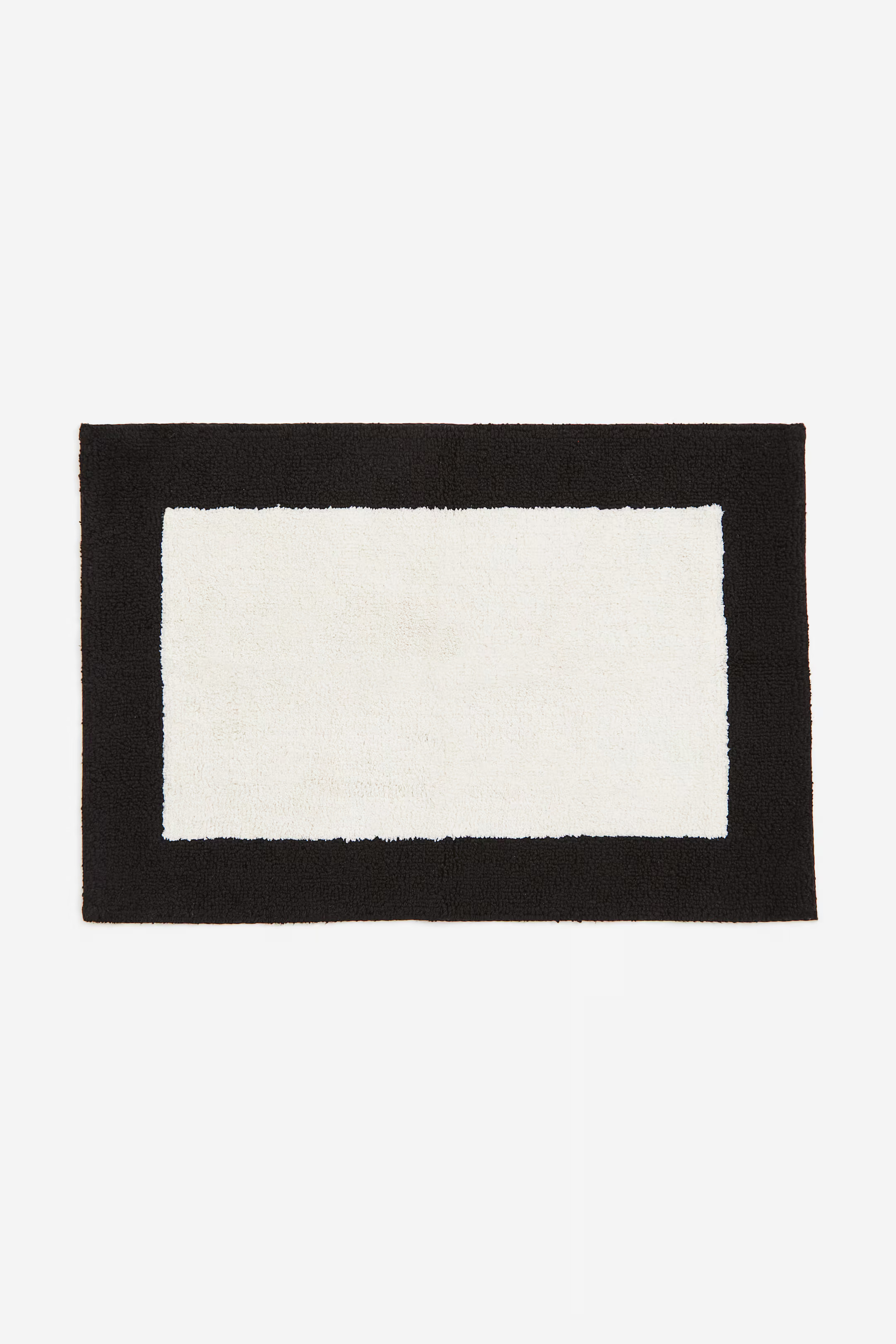 Tapis de bain tufté | H&M (FR, IT, ES, PT, BE)