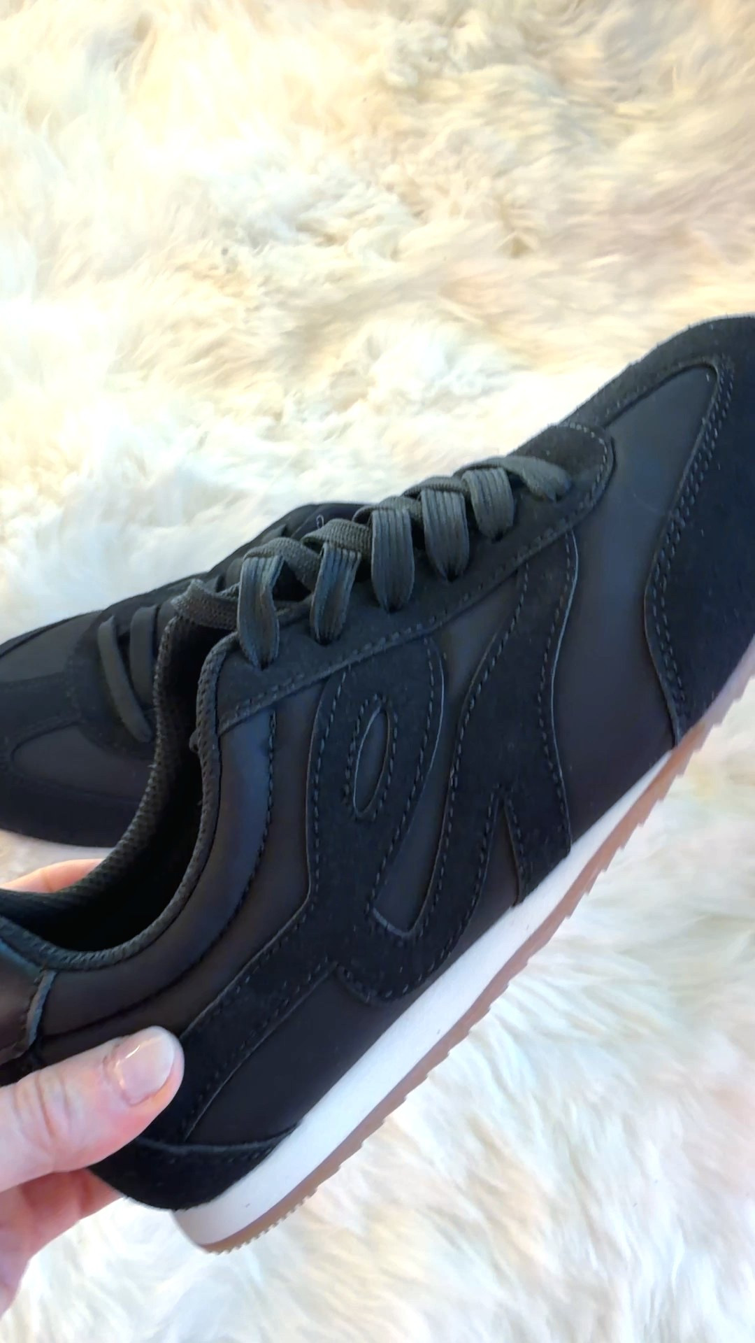 Neutral black tennis - affordable enough that you can get them in every color.

I love these because they are comfortable and understated. They pull the look together without being a distraction.  

 #LTKmomlife #LTKActive