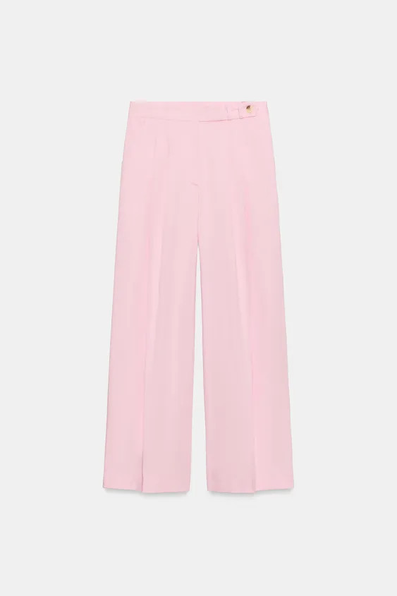 High-waist trousers with front darts. Front pockets and false patch pockets at the back. Wide leg... | Zara UK