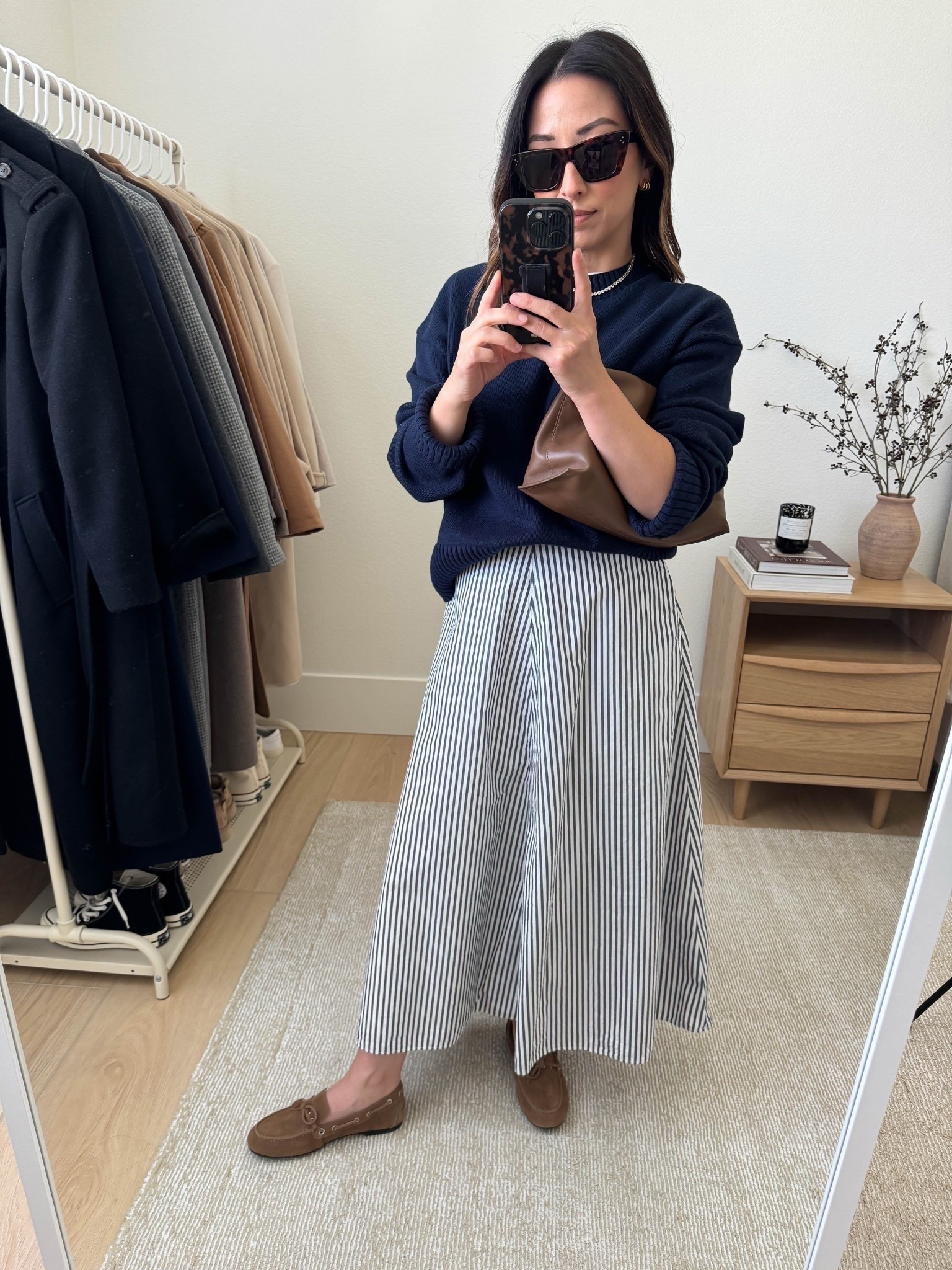 Everlane a line skirt. A great petite-friendly option. But just size down. 

Everlane sweater xs
Everlane skirt 0
Everlane loafers 5.5
Mansur Gavriel bag (old)
Celine sunglasses
J.crew earrings
Dorsey James necklace 15"

Petite style, fall outfits, fall style, business casual 

#LTKStyleTip #LTKPetite #LTKItBag