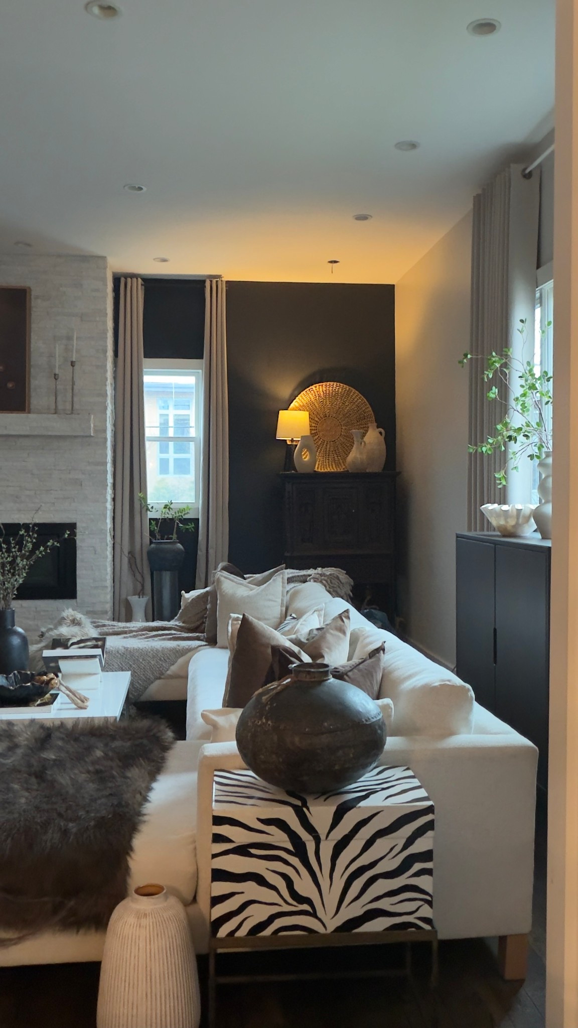 This is my favorite view of my living room.  Moody tones and contrasting colors. Sectional seating, living room inspo. Cozy corner, interior design, Home decor finds.  

#LTKHome