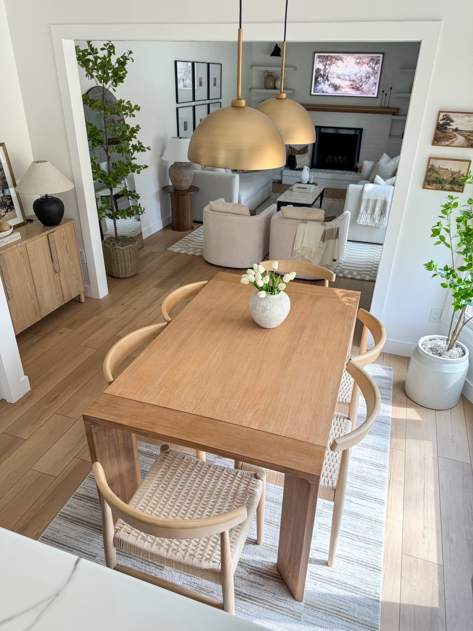 Neutral cozy & inviting home finds🤎

#homefinds #neutralpieces #diningtable #diningchairs #buffet #sofa #chandelier #neutralhome 

#LTKSaleAlert #LTKHome