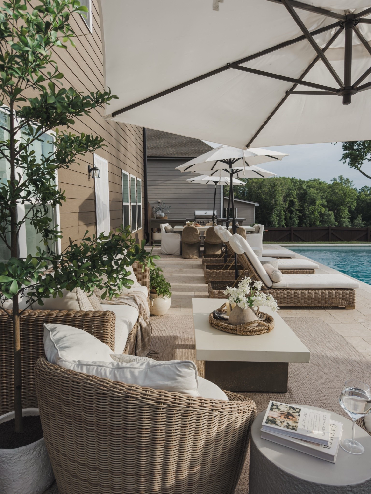 Our backyard has become one of our favorite places to spend time as a family, and every detail was chosen with both beauty and longevity in mind.

One of the best decisions we made was using travertine for the pool decking. Not only does it give the space a timeless look, but it stays comfortable even during our hot Georgia summers. We paired it with a matte white pool tile for a clean, classic look that works beautifully with the architecture of our home.

When it came to furniture, we invested in all-weather wicker pieces from Pottery Barn, and they have exceeded my expectations. Between the full sun, wind, rain, and everyday use, they have held up incredibly well. The quality has been worth every penny, and I still love them just as much as the day they arrived.

I wanted this space to feel collected, relaxed, and built to last, and a year later, it's still exactly where you'll find us most evenings.

#LTKHome #LTKSaleAlert #LTKSeasonal
