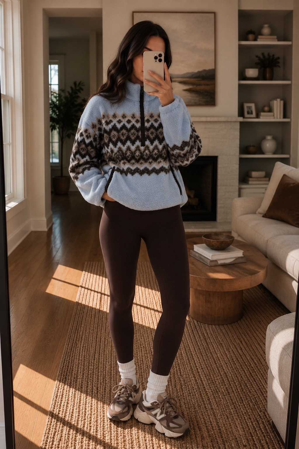 Cozy fall outfit perfection! 🤎🩵 Loving this light blue Fair Isle quarter-zip fleece paired with chocolate brown leggings and New Balance 9060 sneakers! The perfect mix of comfy and cute for running errands, casual weekends, school drop-offs, or chilly fall days. 🍂 Such an easy everyday athleisure look you’ll want to wear on repeat! Shop the outfit details on LTK! ✨