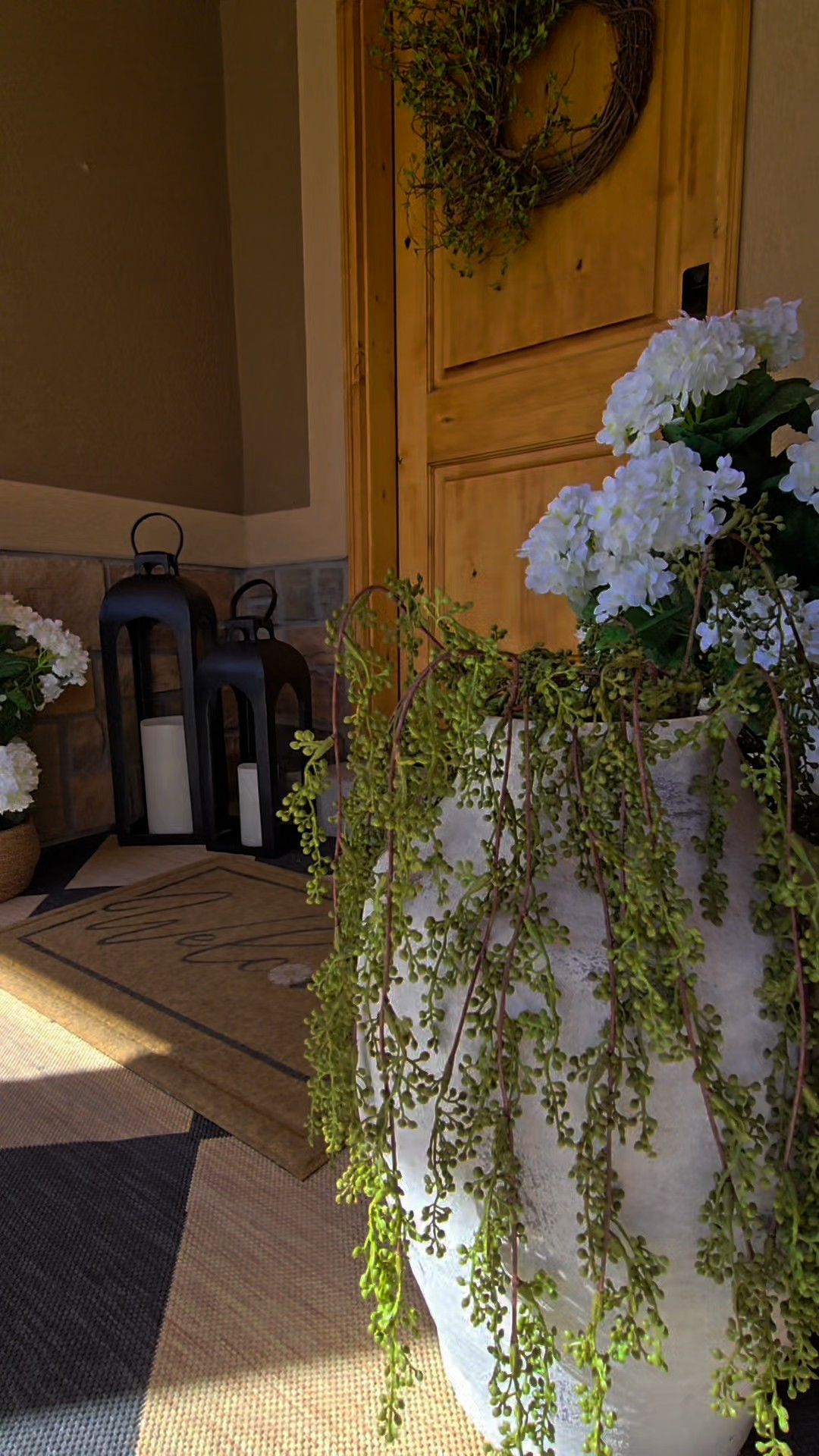 Little spring refresh on the front porch 🌿Added tall hydrangea bushes, the coziest daybed swing, and layered in my favorite metal lanterns with wicker planters. This little porch has officially become my favorite cozy oasis. Linking everything here for you.

#LTKHome #LTKU #LTKSeasonal