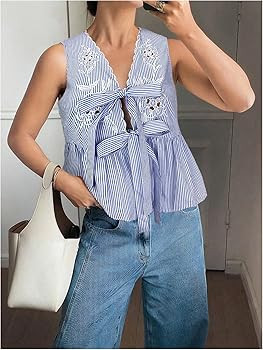 WDIRARA Women's Bow Tie Front Blouse V Neck Sleeveless Shirt Eyelet Embroidery Ruffle Peplum Tops | Amazon (US)