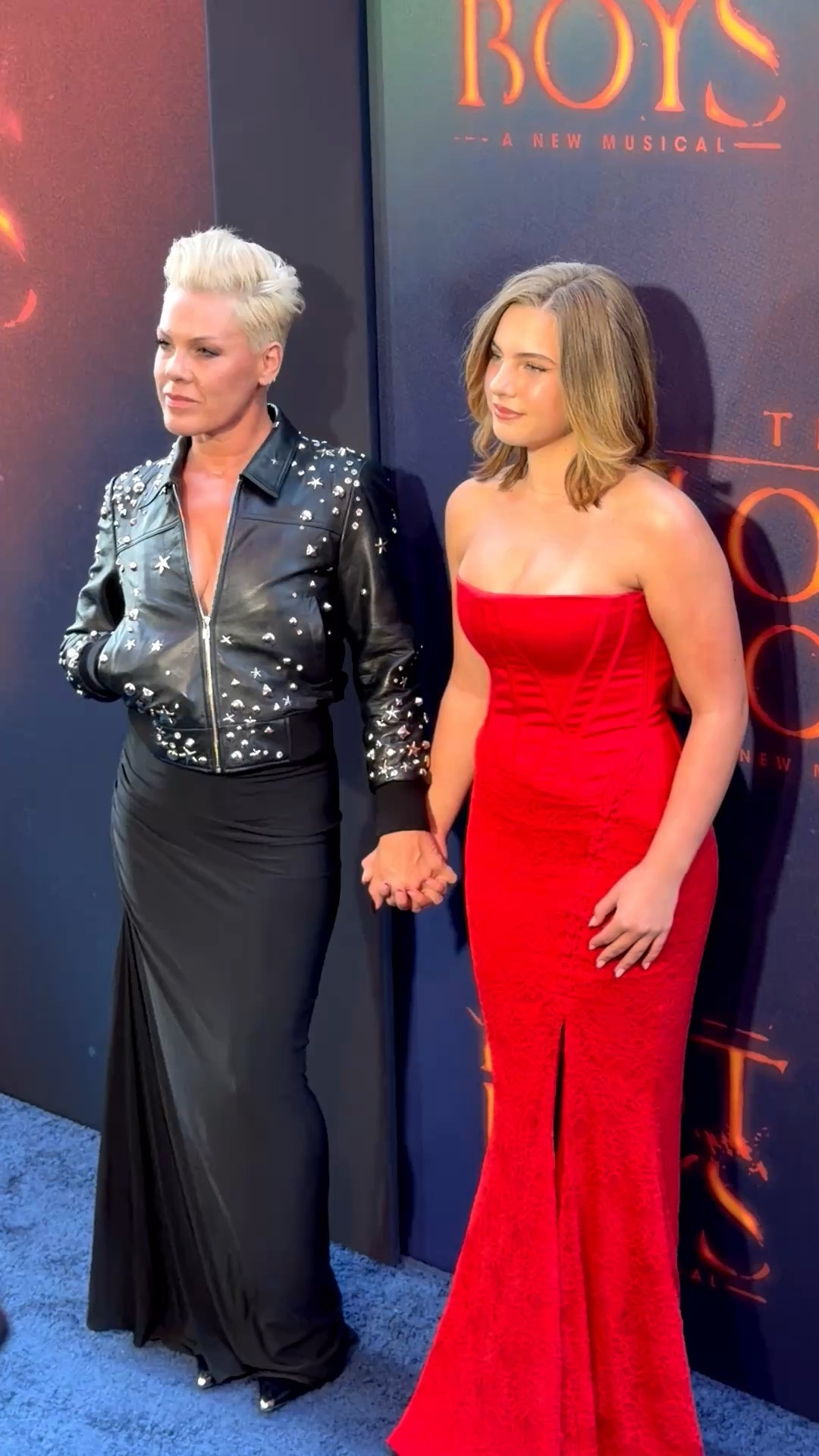 @pink posed with her daughter @willowsagahart at The Lost Boys Broadway premiere, with Pink in an @r13 studded jacket and Willow in a $289 @houseofcb Valerie Red Satin Lace Strapless Maxi Dress. Hot! Or Hmm..?

🎥: @JPASC24

#pink #willowsagahart #pinkstyle #r13 #fashionbombdaily