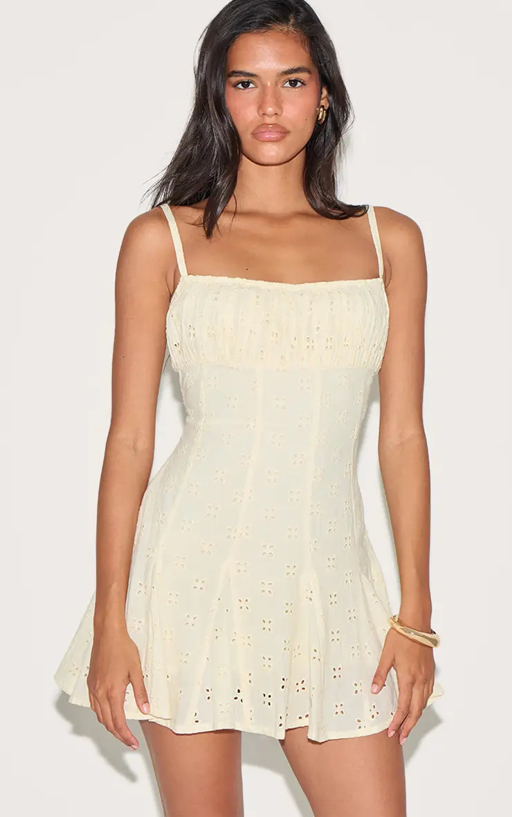 Lemon Broderie Strappy Pleated Shift Dress | PrettyLittleThing UK