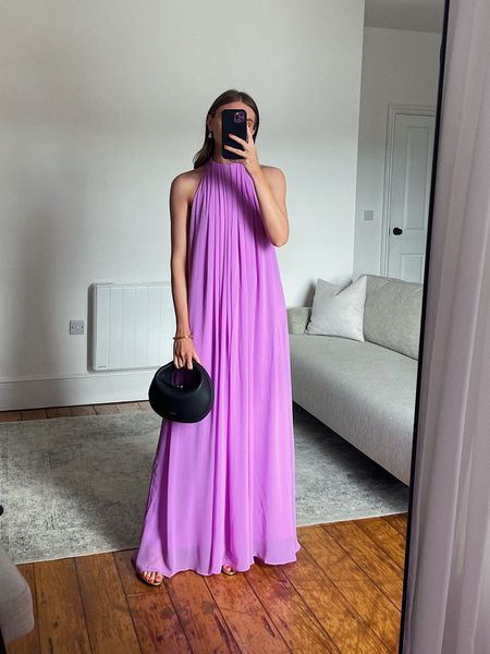 Summer occasion wear/wedding guest inspiration 
Wearing a size 8 in the ASOS lilac/pink trapeze maxi dress. I’m 5ft 6 
Songmont black bag (can’t link on here) so have linked similar 
Monica vinader gold bangle 
