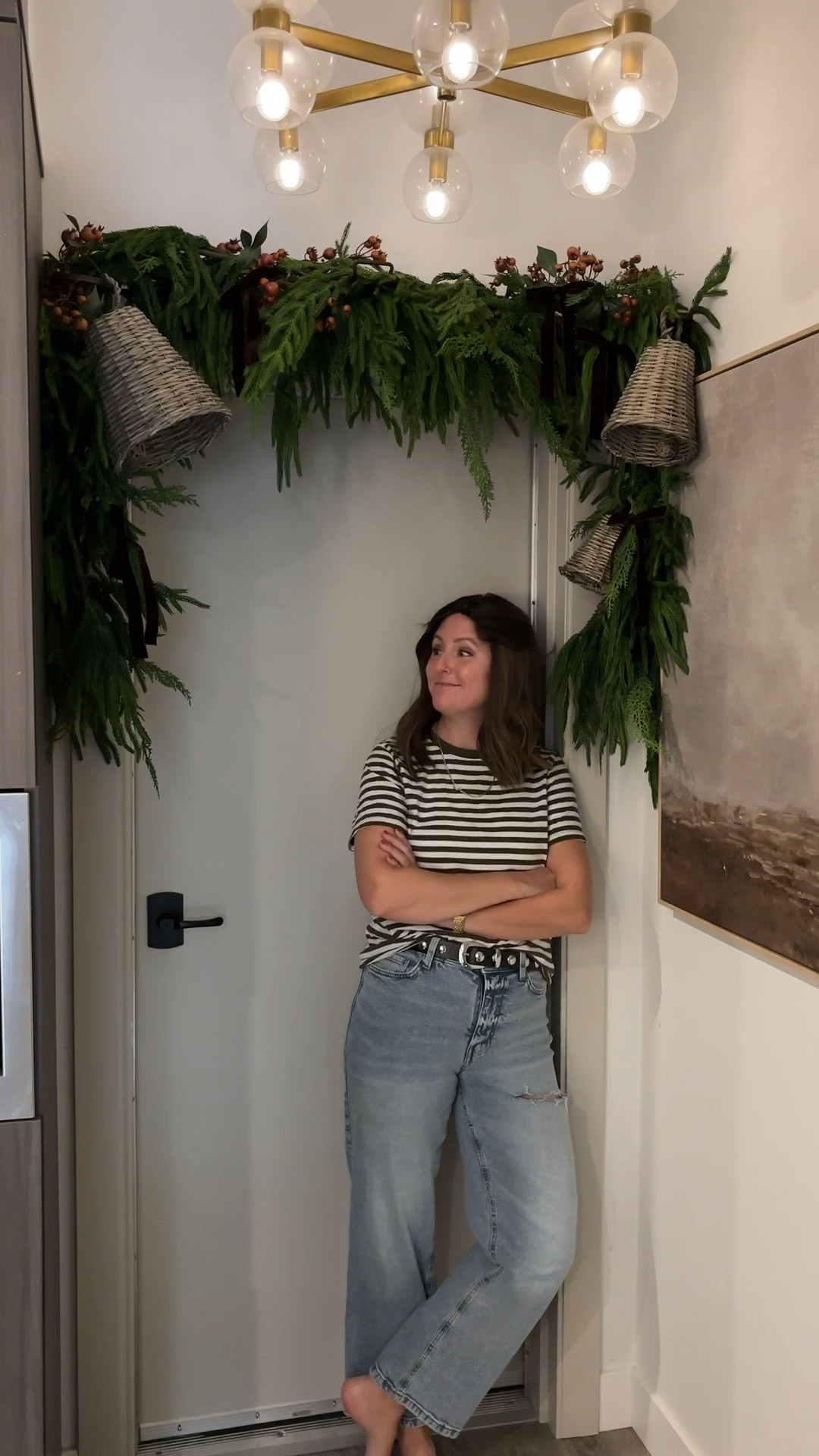 If you’ve been wondering how to hang a garland around a door without nails or command strips… this is your sign. 🎄

I used a tension-fit garland hanger (no damage, no tools, totally renter-friendly) and layered in 2 faux cedar garlands, berries, and a few woven bells for that warm, collected holiday look. This is honestly the easiest holiday decorating hack if you live in a small space, an apartment, or just don’t want to deal with patching holes in January.

My whole entryway took under 30 minutes to transform — and now it looks like a cozy Christmas cottage every time I walk in. If you love holiday home decor, entryway decorating, garland styling ideas, or minimalist holiday vibes, save this for later.

Linking to everything I used here, including the Christmas garland and wicker bells. 🔔 

#LTKHome #LTKFindsUnder100 #LTKHoliday