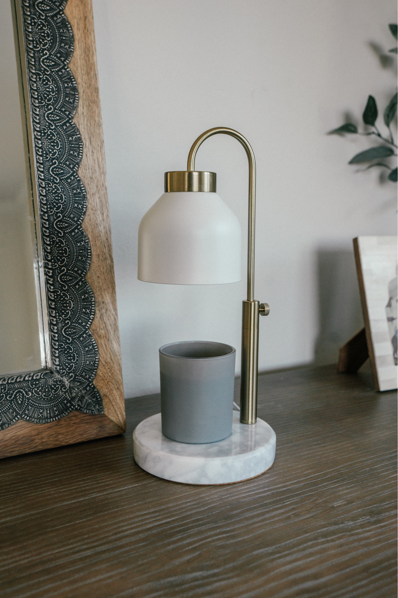 Obsessed with this candle warmer. There’s no flame, it melts the wax evenly and I can leave it on throughout the day. And this specifically candle scent from is 😮‍💨.

#LTKhome #LTKfindsunder100